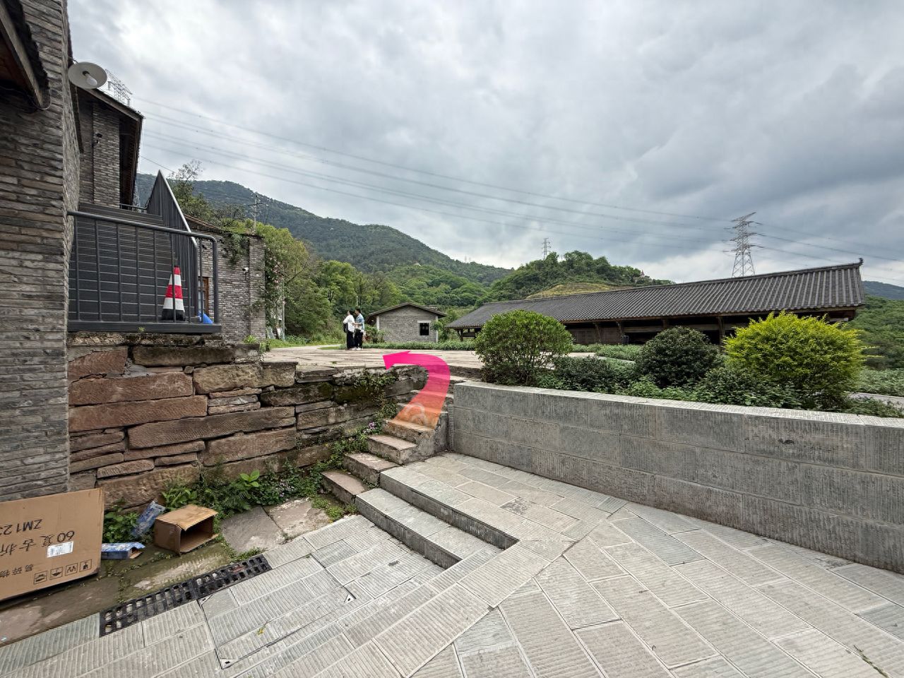 Go up the stairs, turn left, and walk straight for 10 meters. — step-by-step photo guide