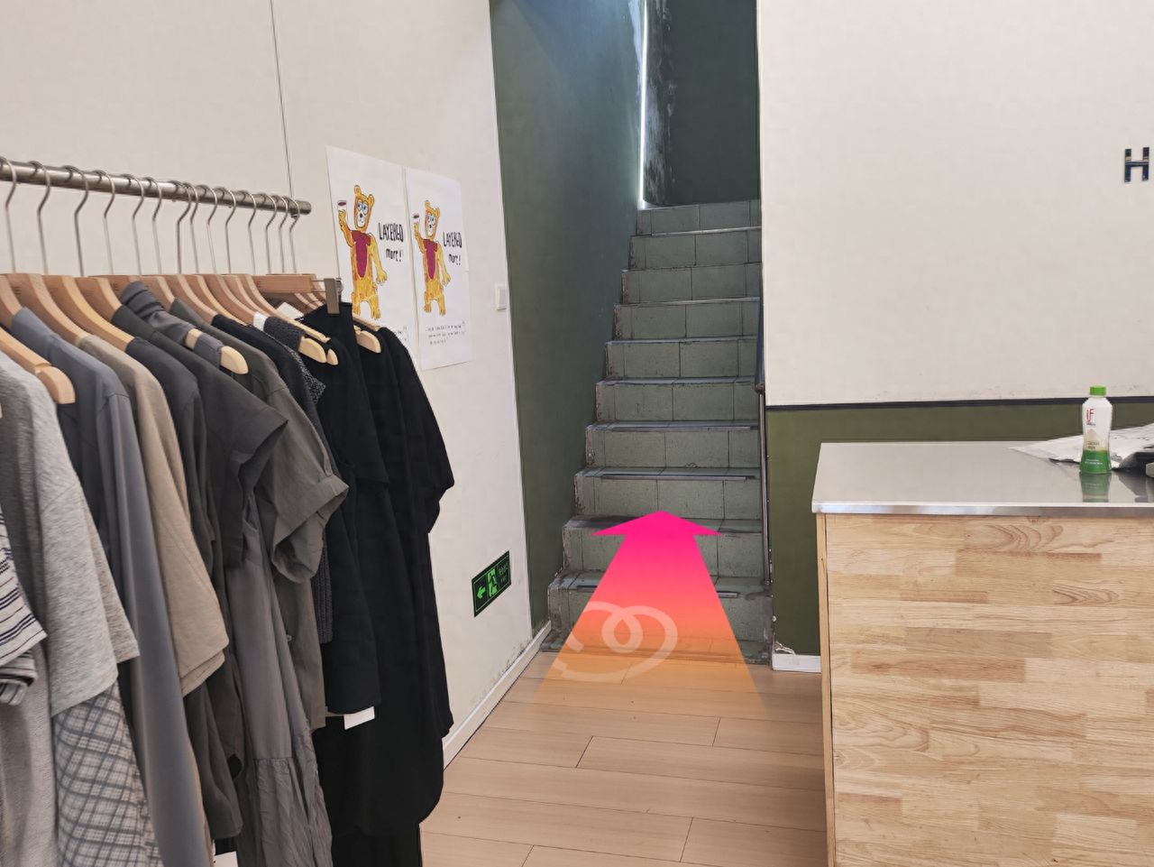 Go up the stairs on the left side of the front desk to the second floor. — step-by-step photo guide