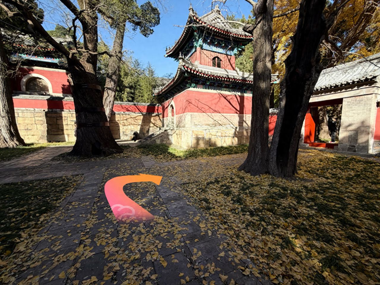 Turn right after entering the courtyard and head to the red door. — step-by-step photo guide