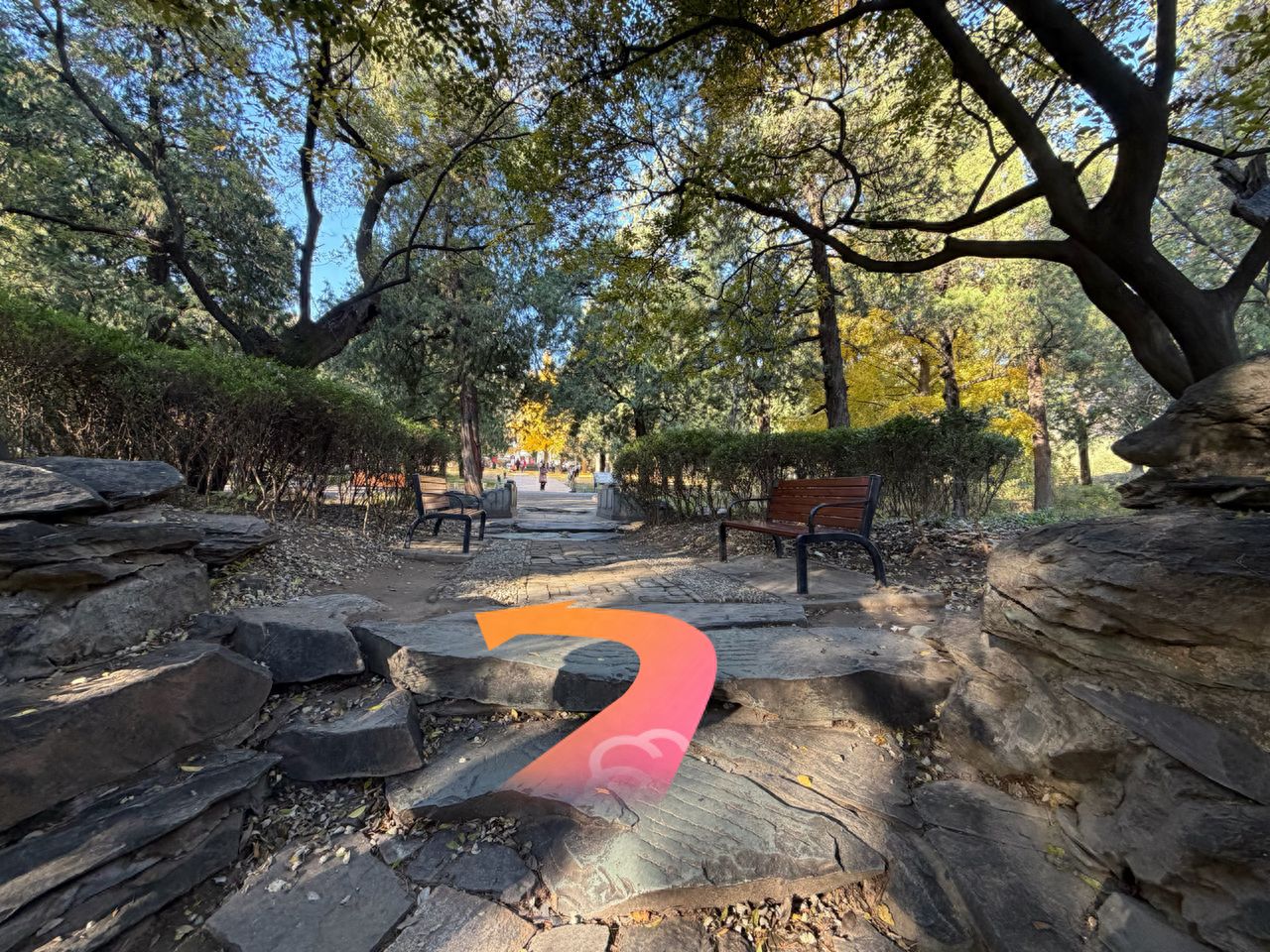 After going up the stairs, turn left and head up the hill. — step-by-step photo guide