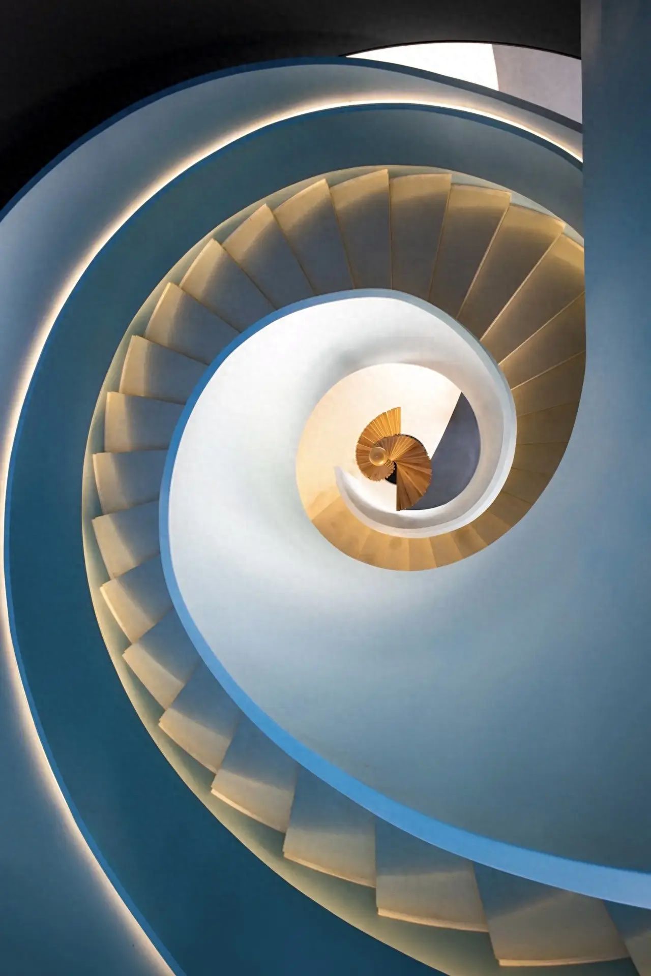 Photo by Zhongguancun SOHO - Blue Rotating Staircase