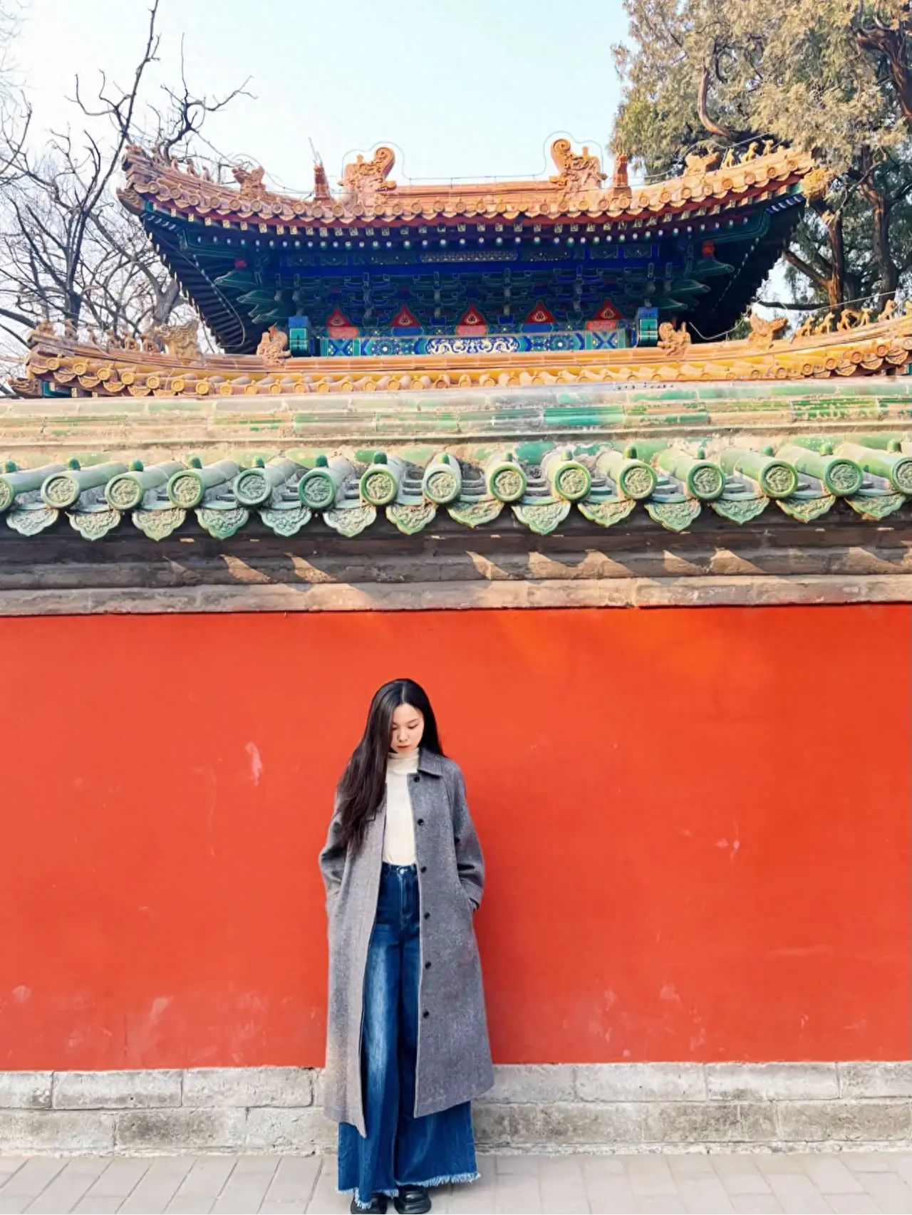 Photo by Imperial Academy - Red Wall Architecture on the Outer Street