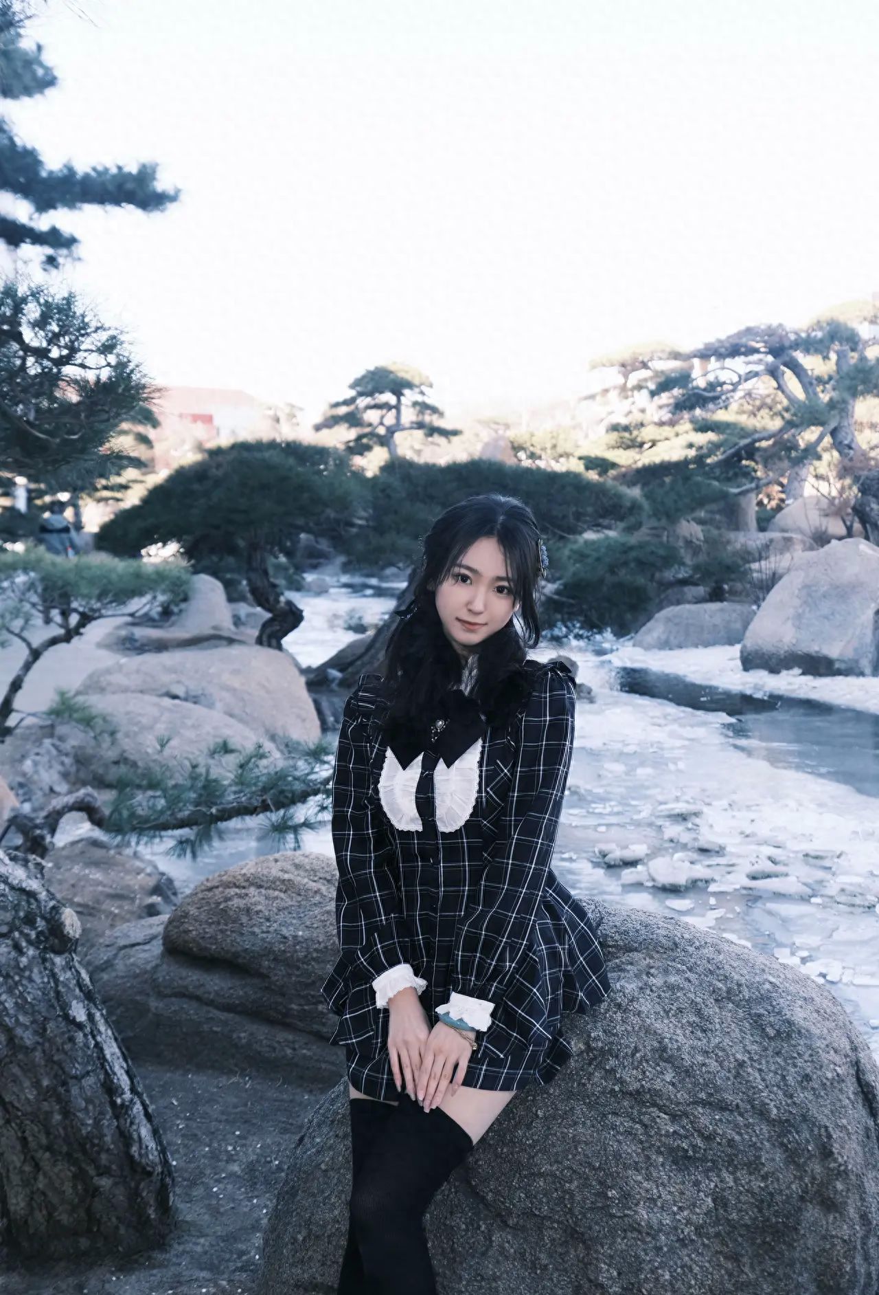 Photo by Luo Hong Photography Art Museum - By the Stones Near the Pond