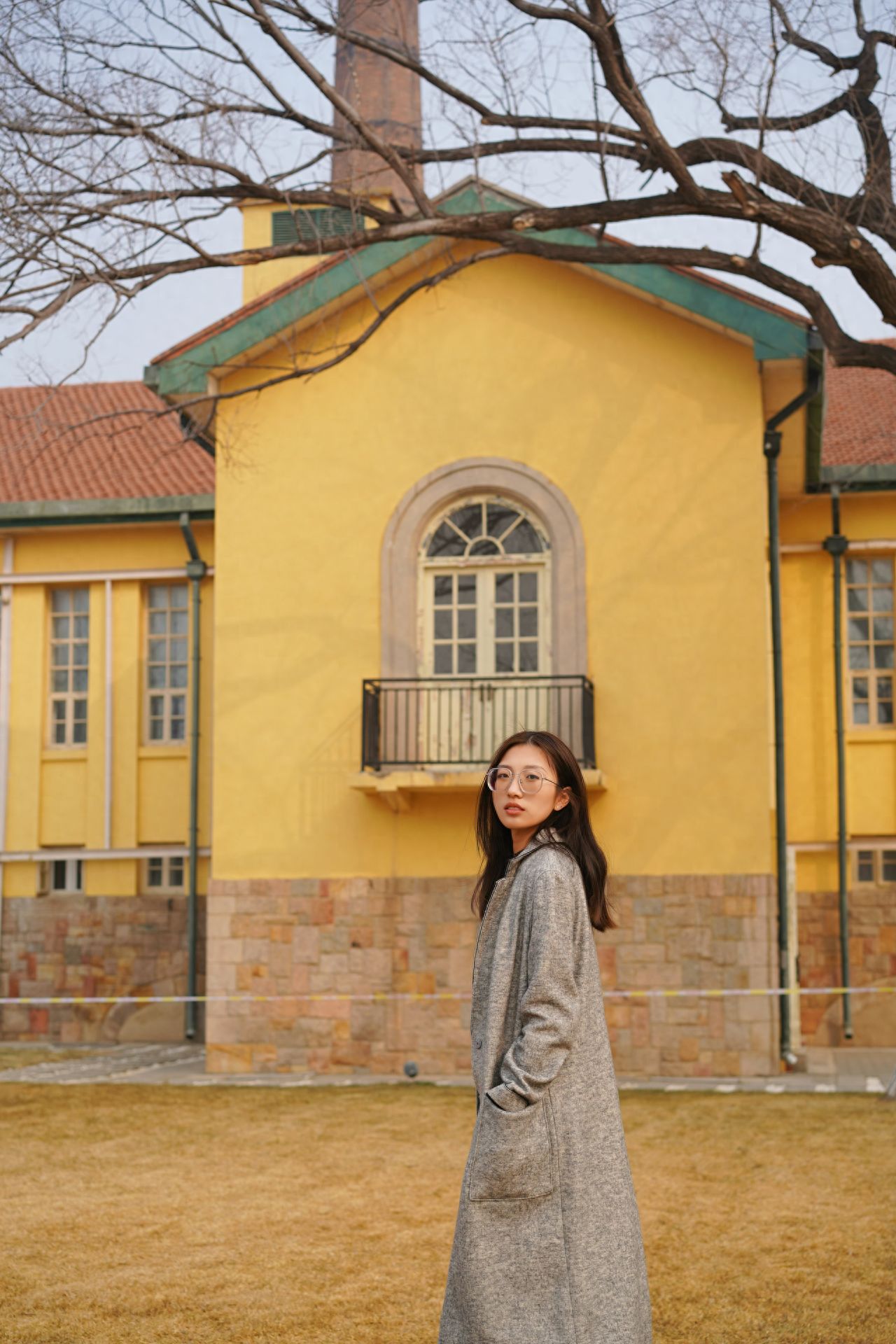 Photo by Space 491 - In front of the arched window of the Yellow House