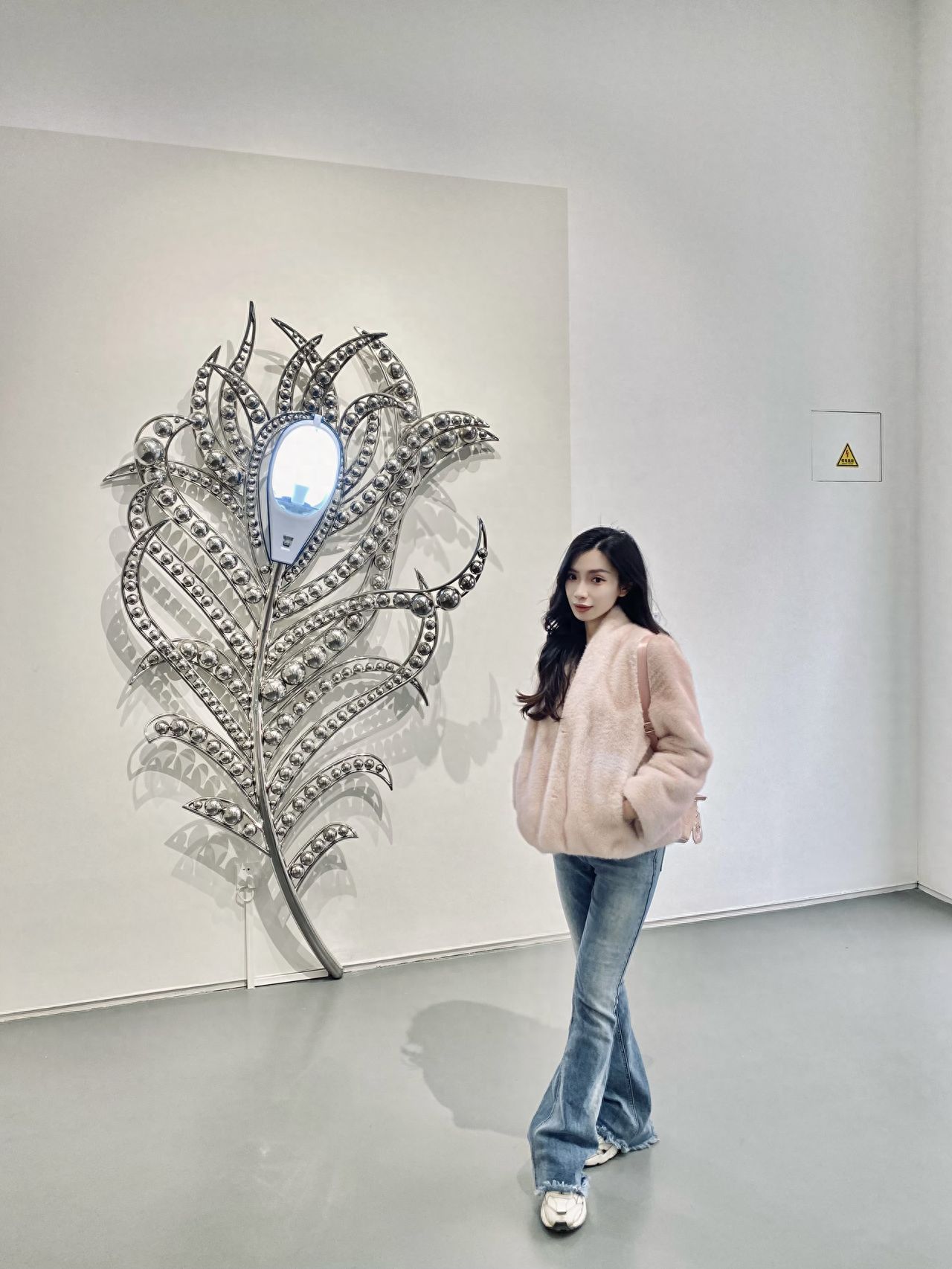 Photo by X Museum - Giant Feather Installation