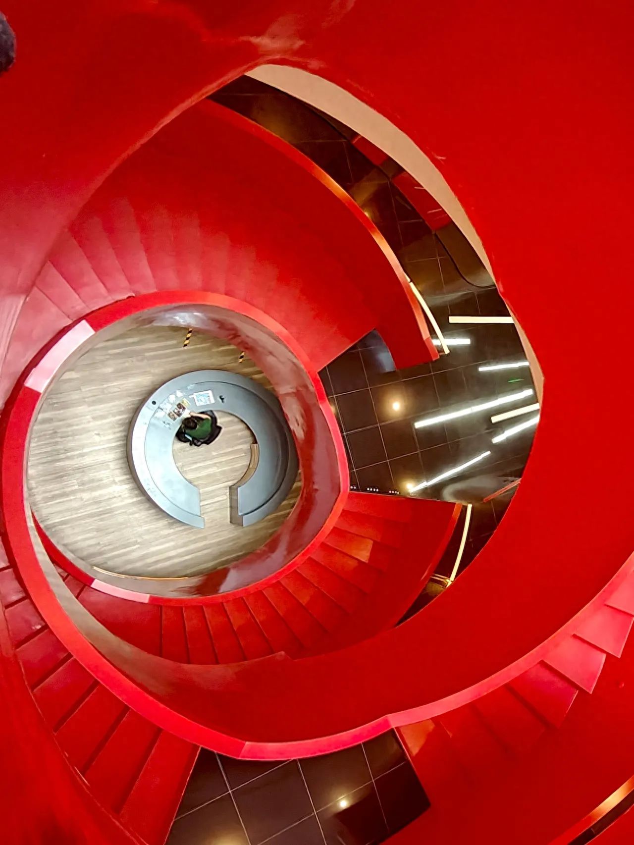 Photo by Zhongguancun SOHO - Aerial view of the red spiral staircase