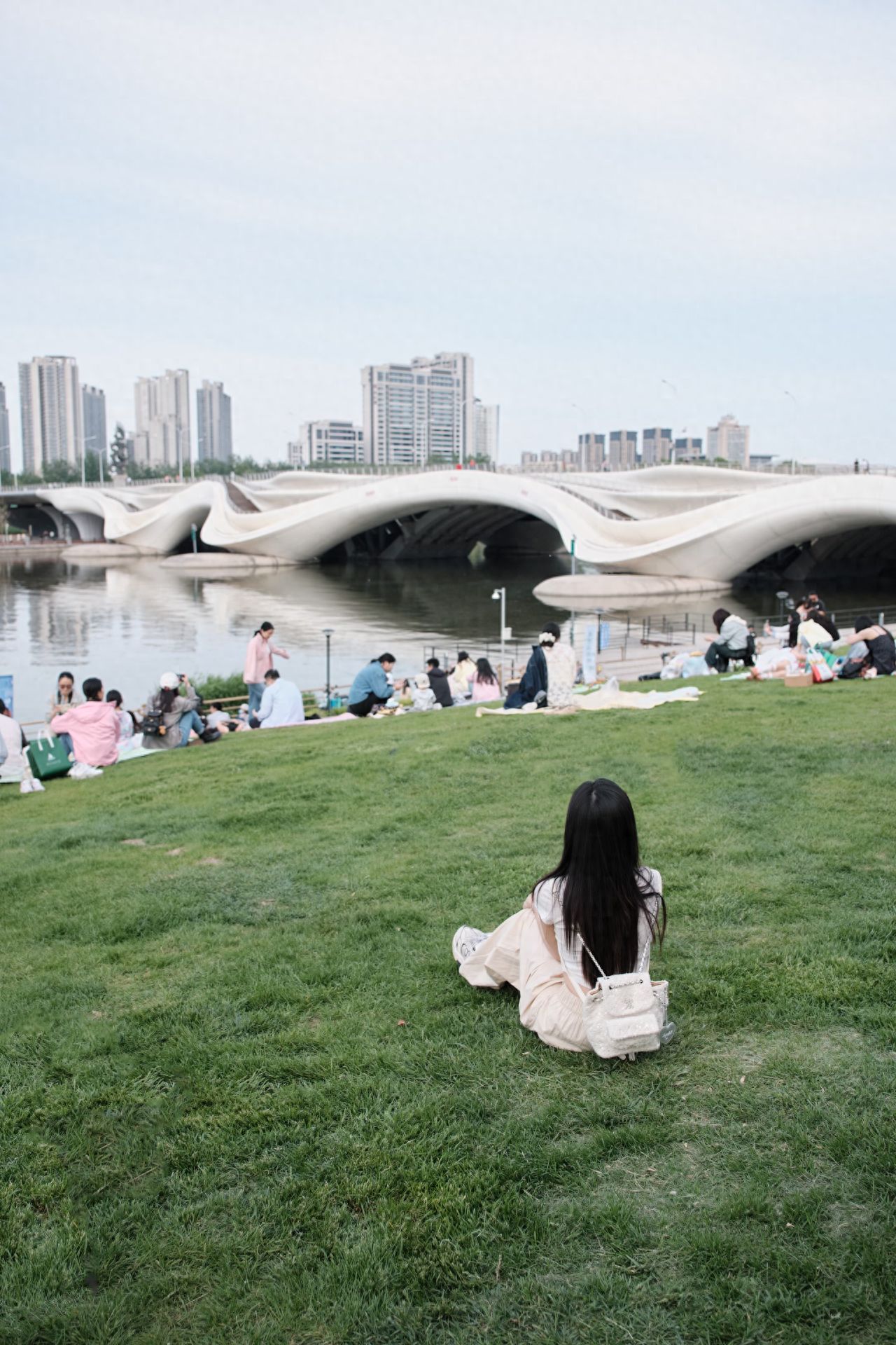 Photo by Thousand Lotuses Pouring Dew Bridge - Grass Slope by the Bridge