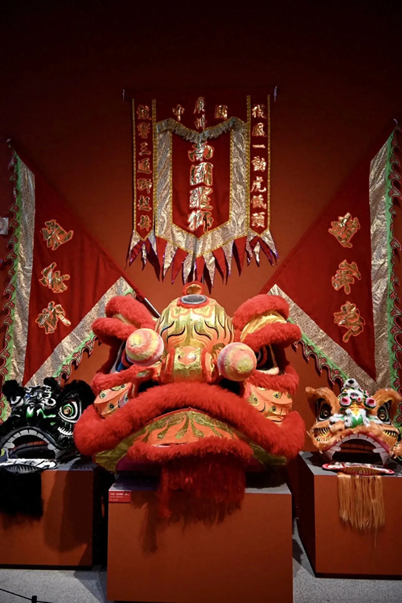 Photo by China National Arts and Crafts Museum - Lion Dance Head and Flags