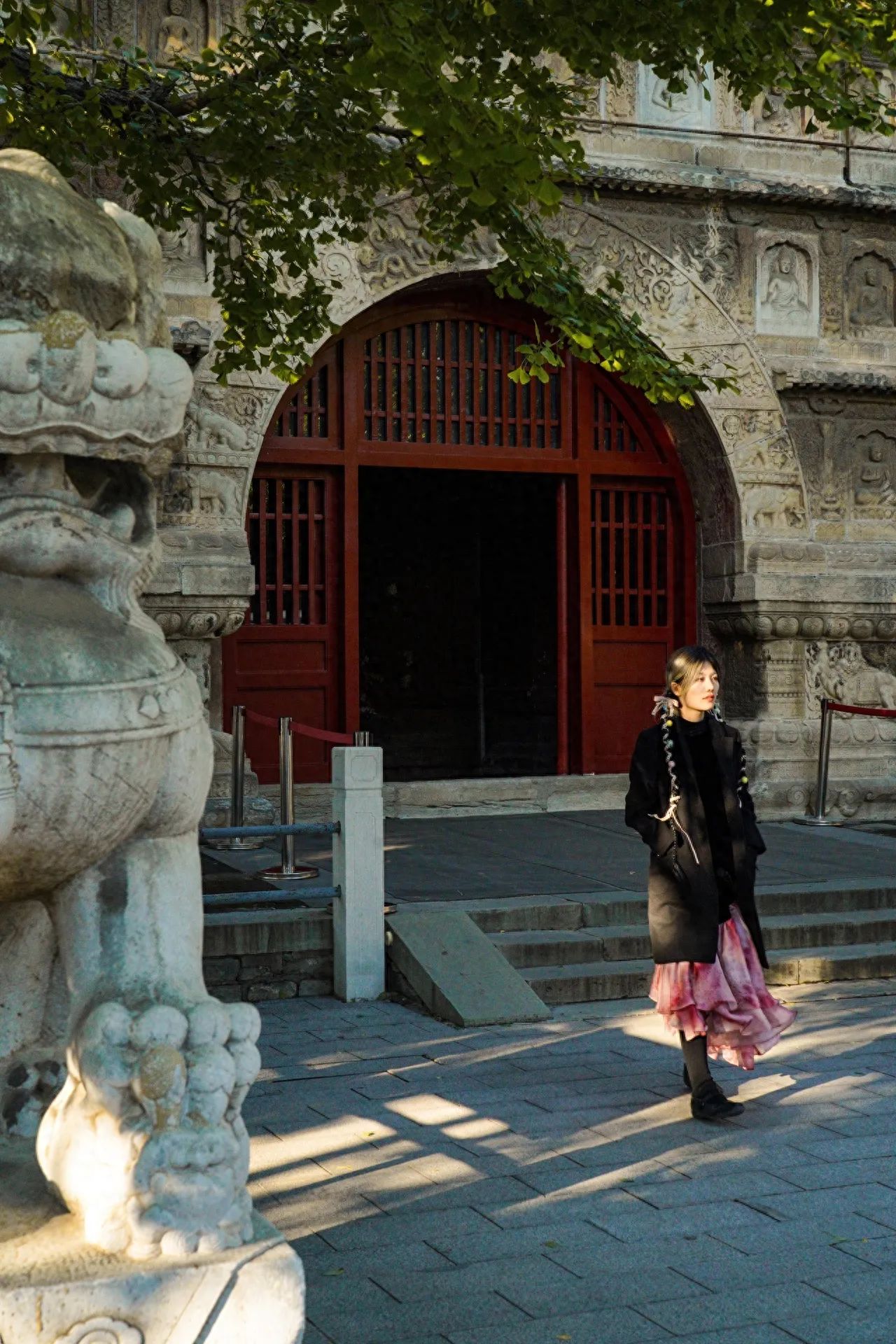 Photo by Wu Ta Si Pagoda - Framed with the entrance of Wu Ta Si and stone lions.