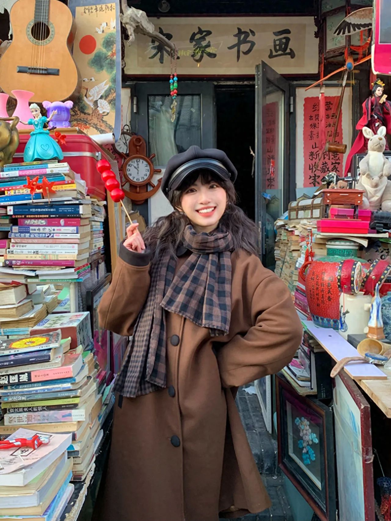 Photo by Song Family Calligraphy and Painting - Taking a photo with the signboard and items in front of the shop.
