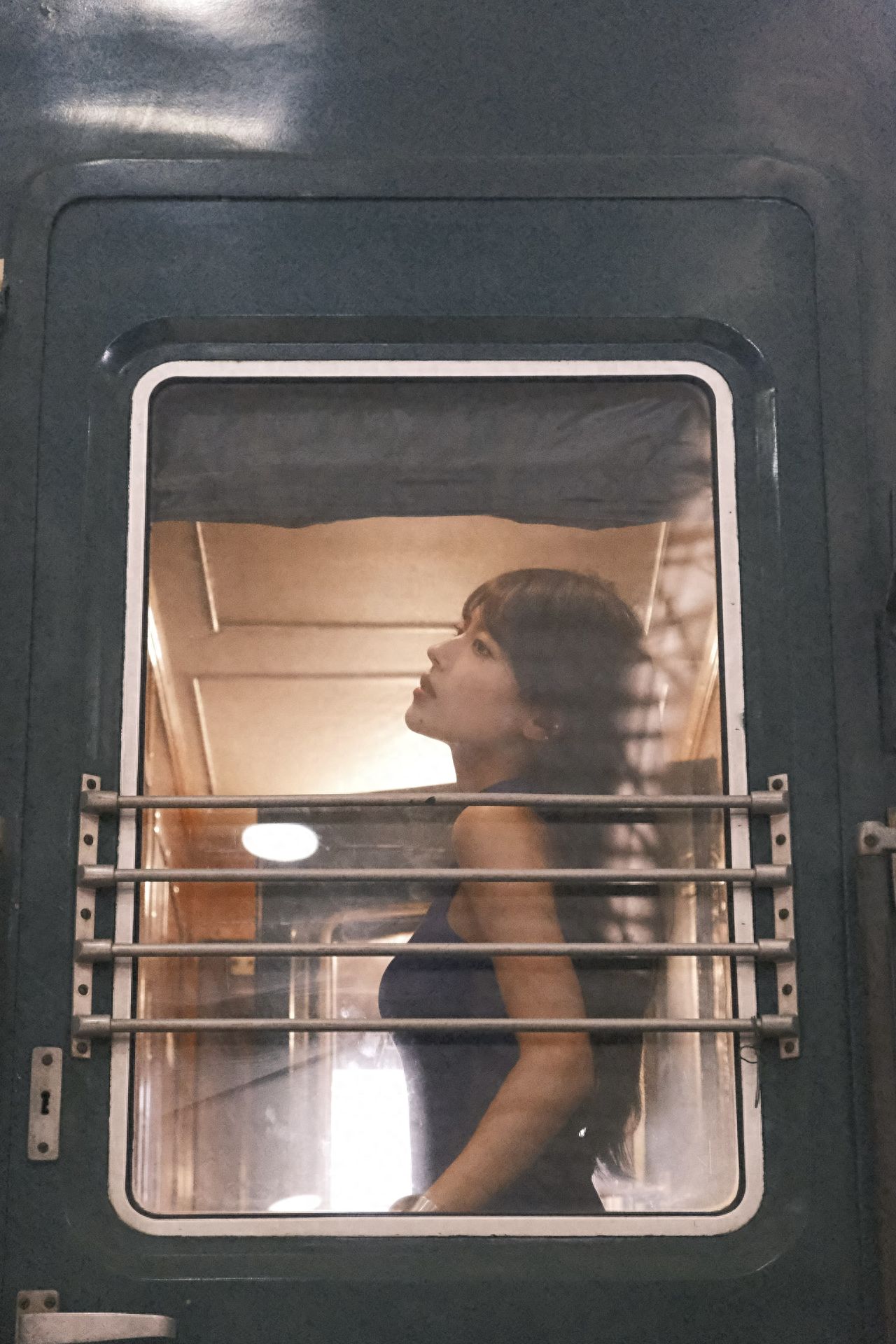 Photo by China Railway Museum - Green Skin Train Car Door Glass