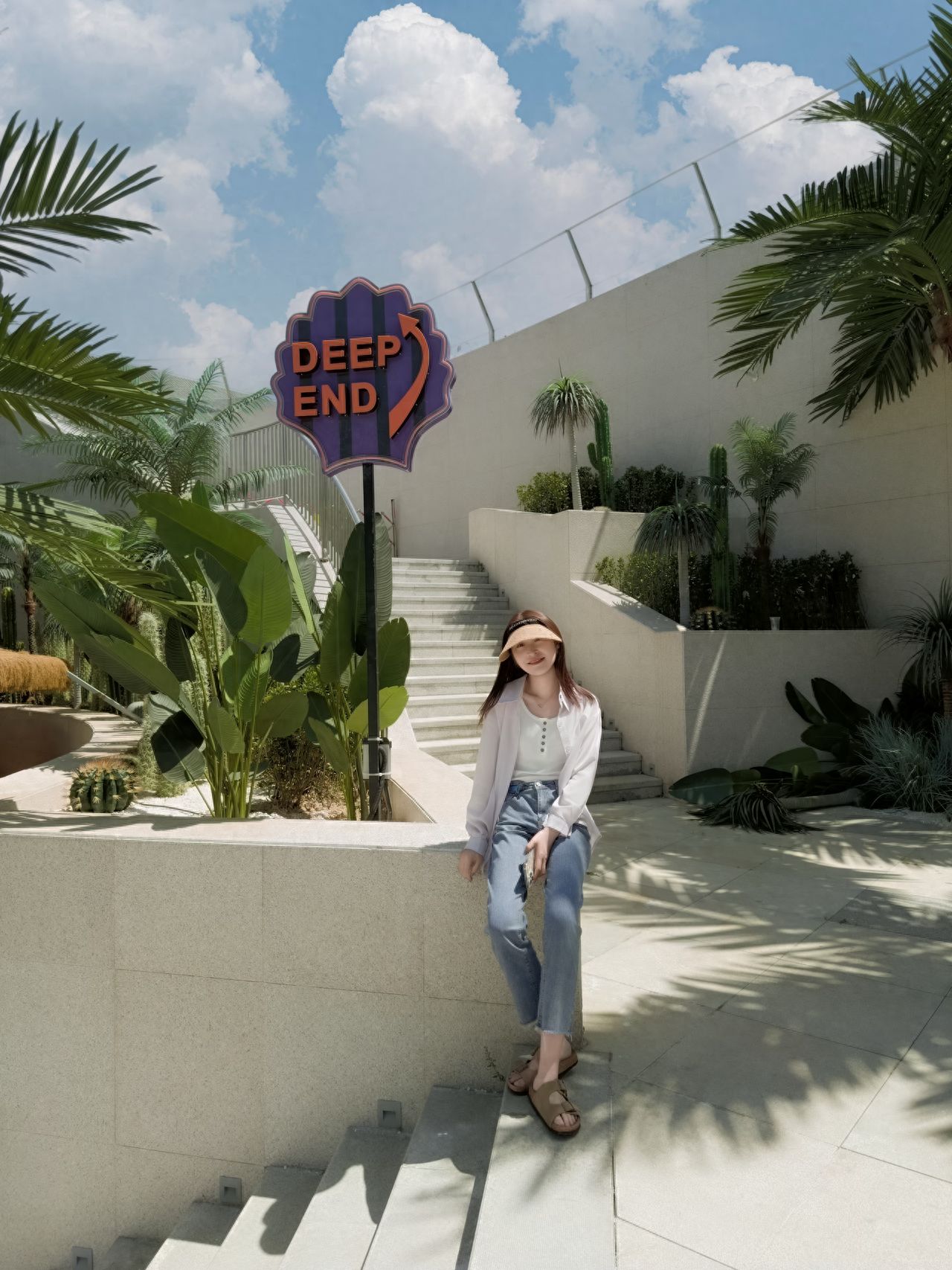 Photo by Hua Shan Garden - Under the DeepEnd Sign