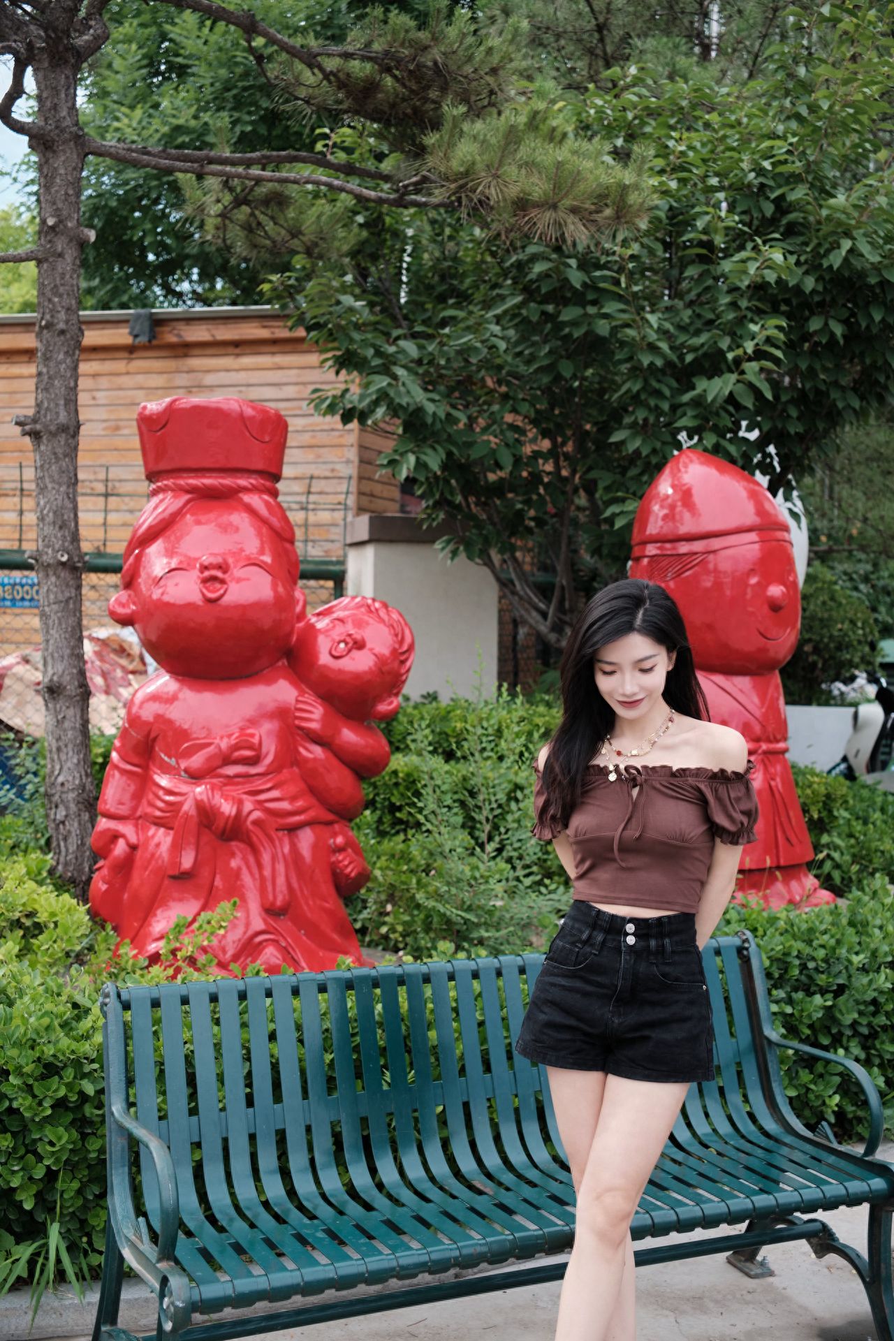 Photo by Moon River Art Town - Red Cartoon Portrait Installation