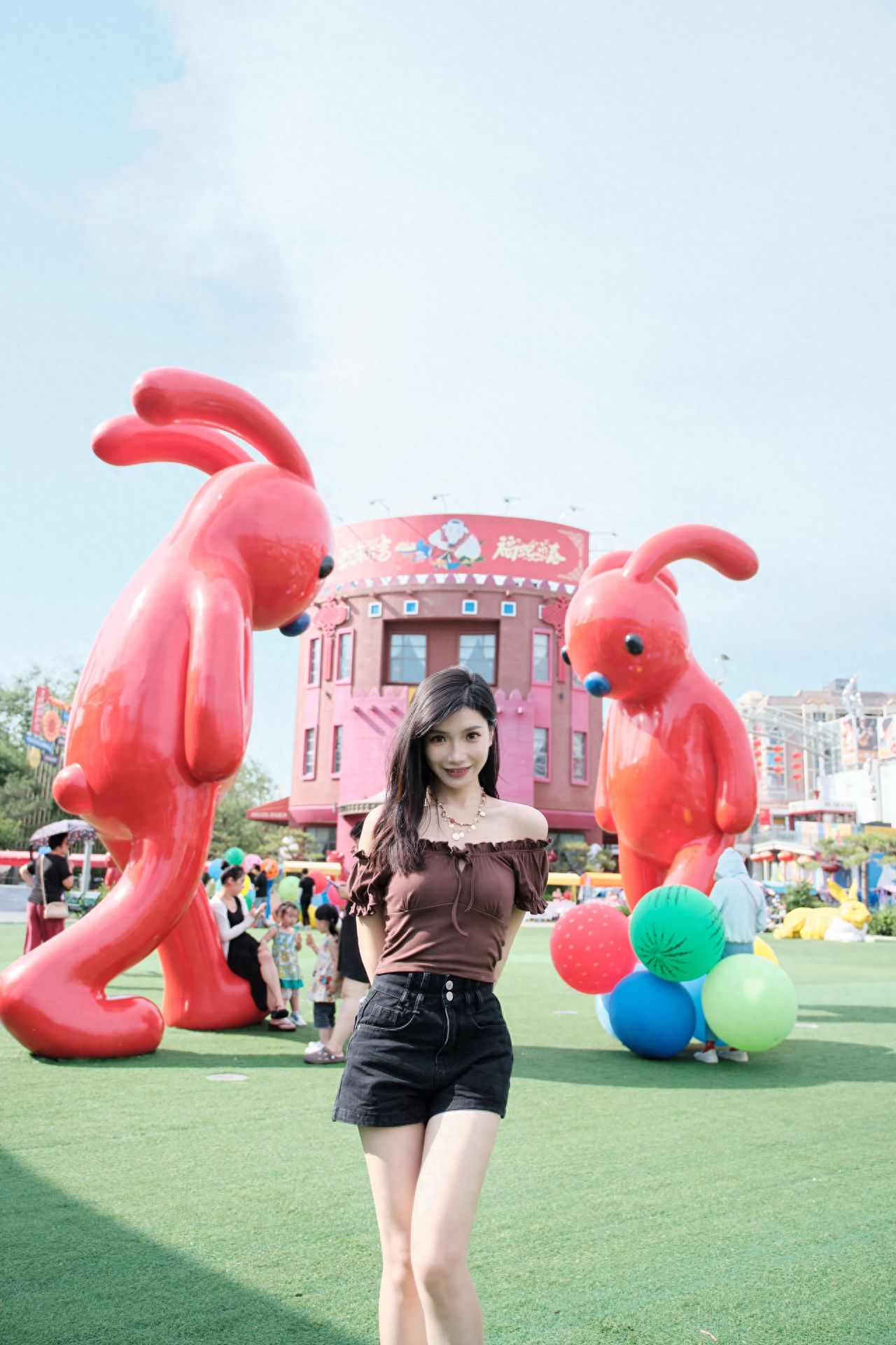 Photo by Moon River Art Town - In the middle of the cartoon rabbit installation