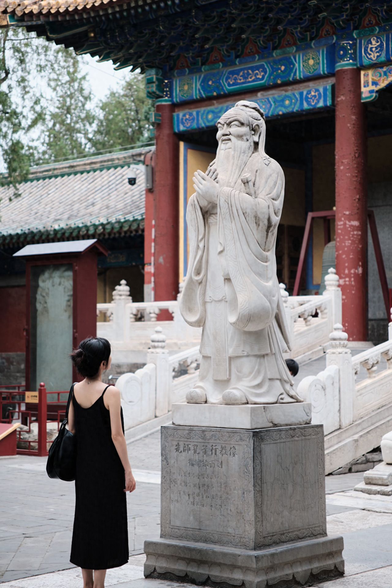 Photo by The Confucius Temple and the Imperial Academy Museum - The white statue of the sage Confucius.