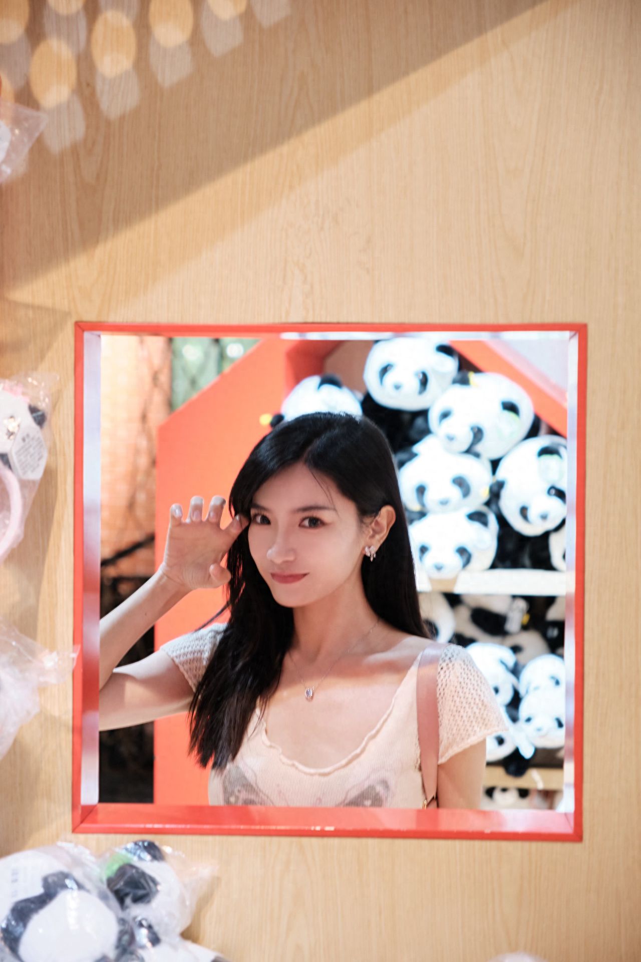 Photo by Beijing Zoo - Panda Cultural and Creative Store Red Window Frame