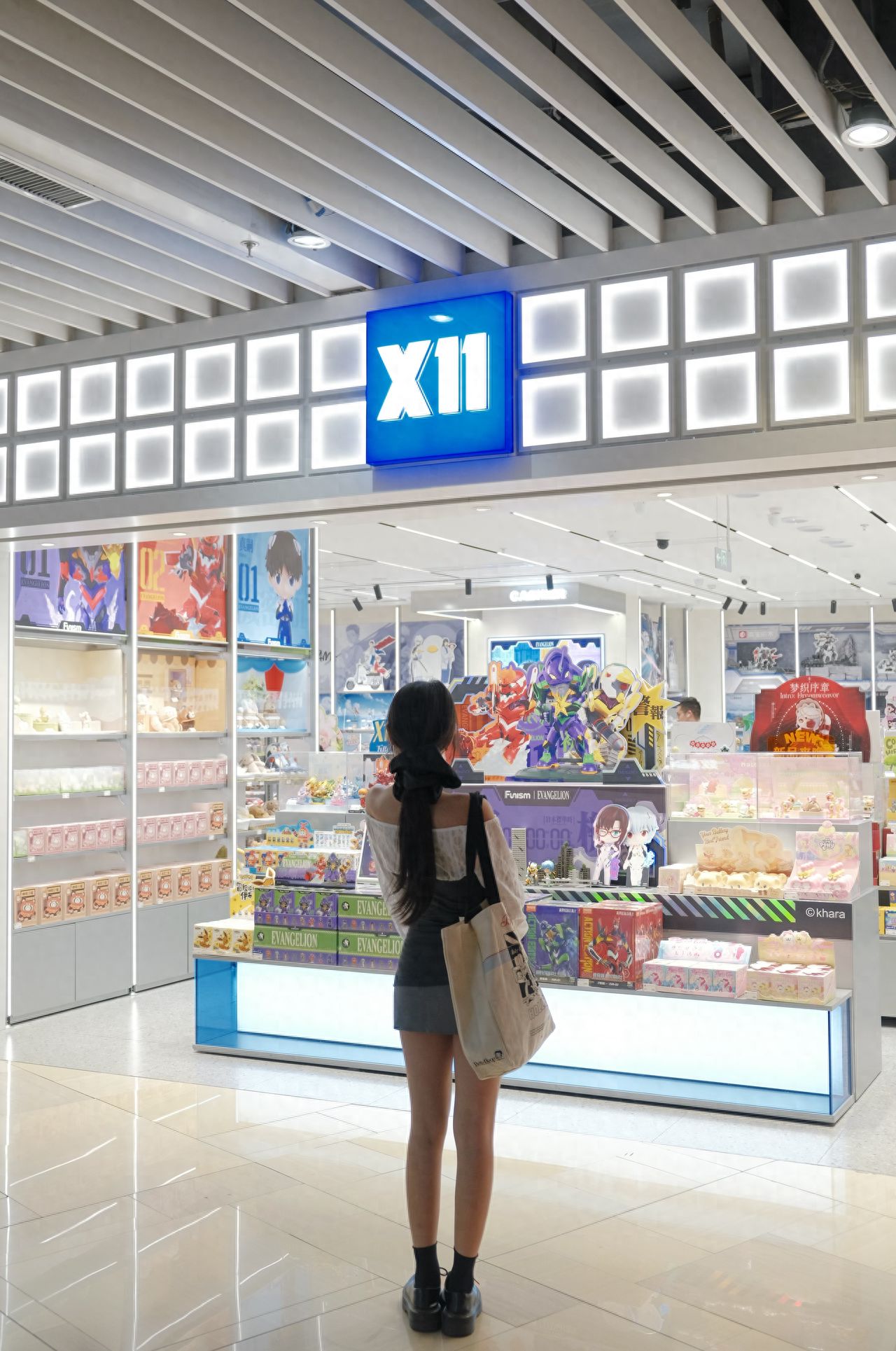Photo by Chaoyang Joy City - X11 Store Sign