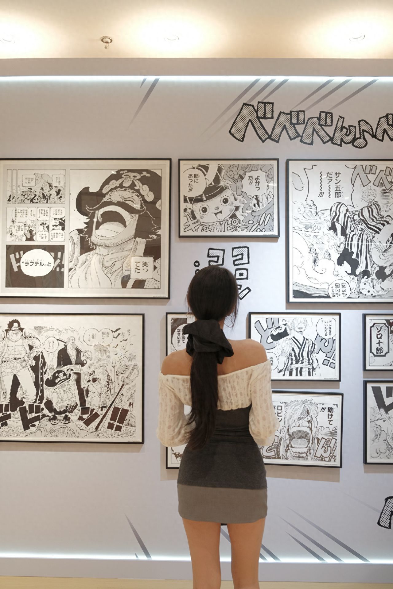 Photo by Chaoyang Joy City - Black and White Comic Wall