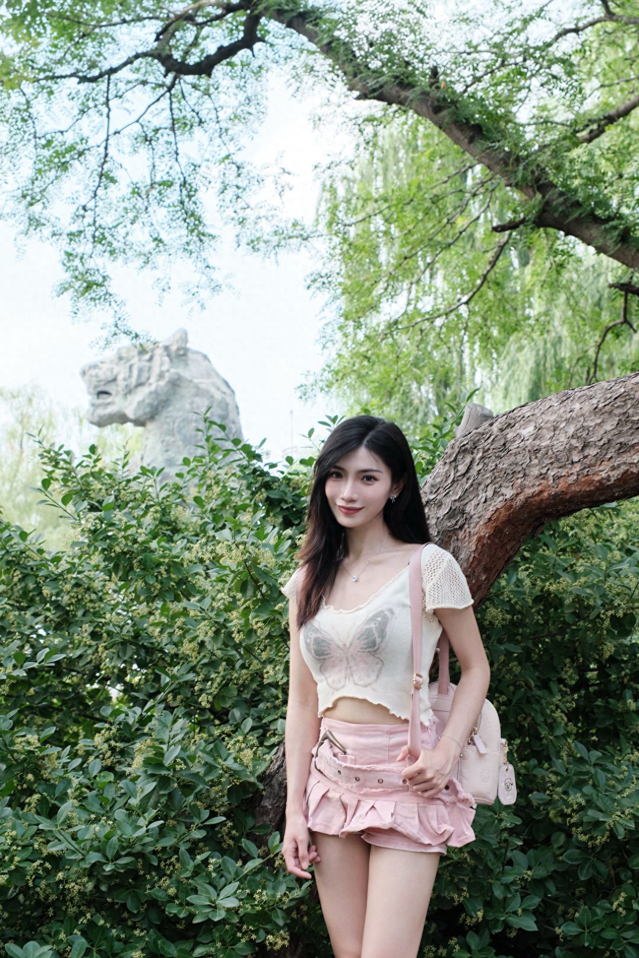 Photo by Beijing Zoo - Trees and Stone Lion Heads
