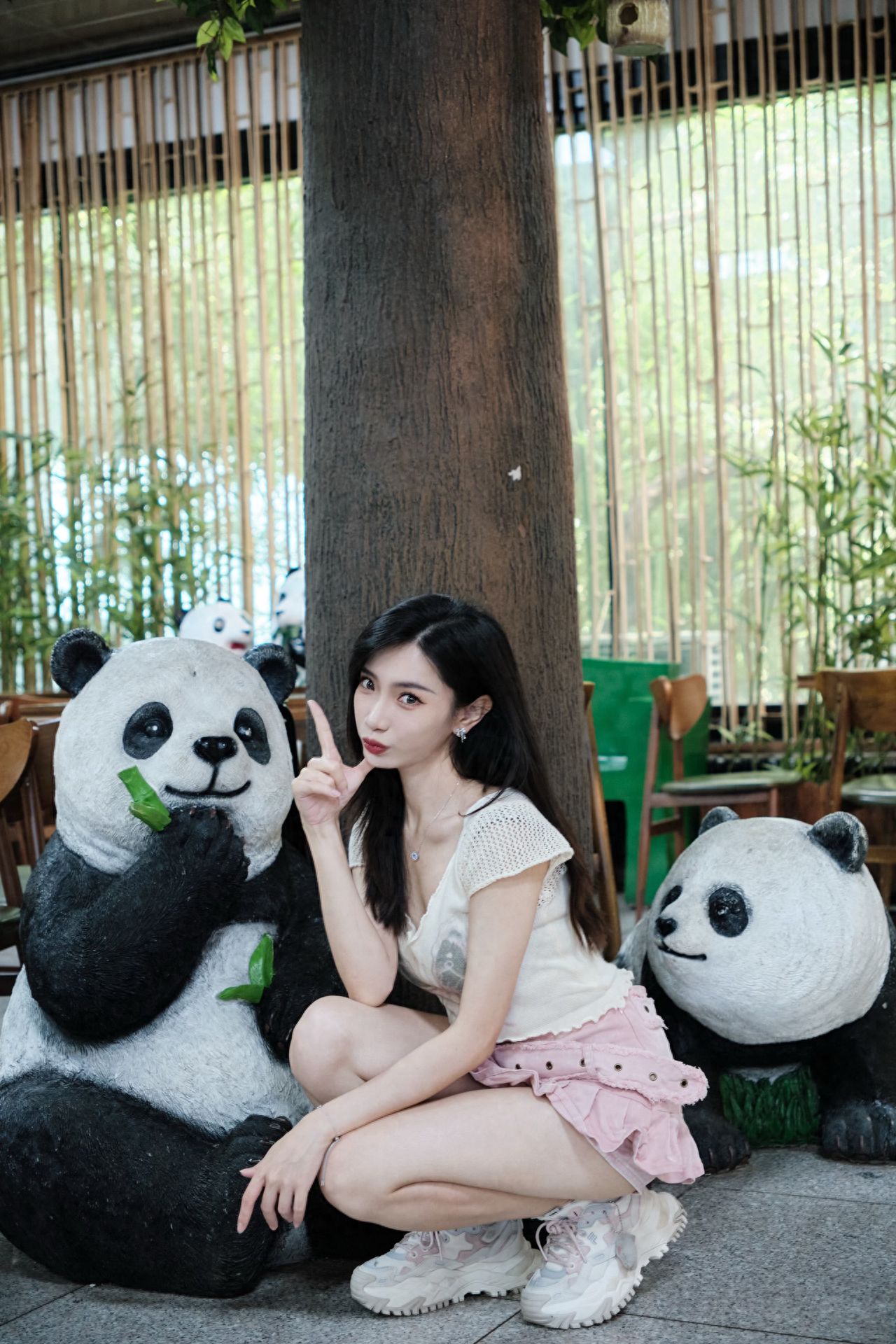 Photo by Beijing Zoo - Giant Panda Cafe with two panda sculptures