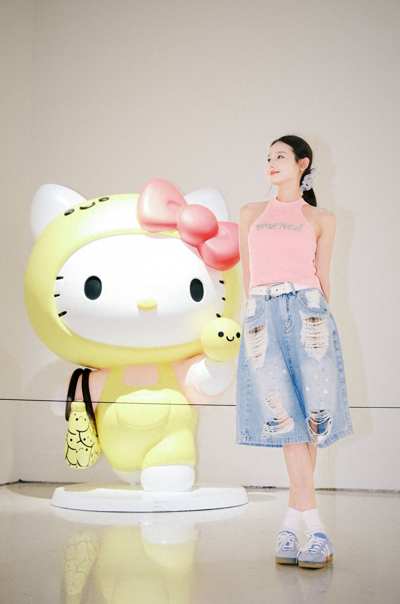 Photo by Beijing Times Art Museum - Yellow Hello Kitty Doll