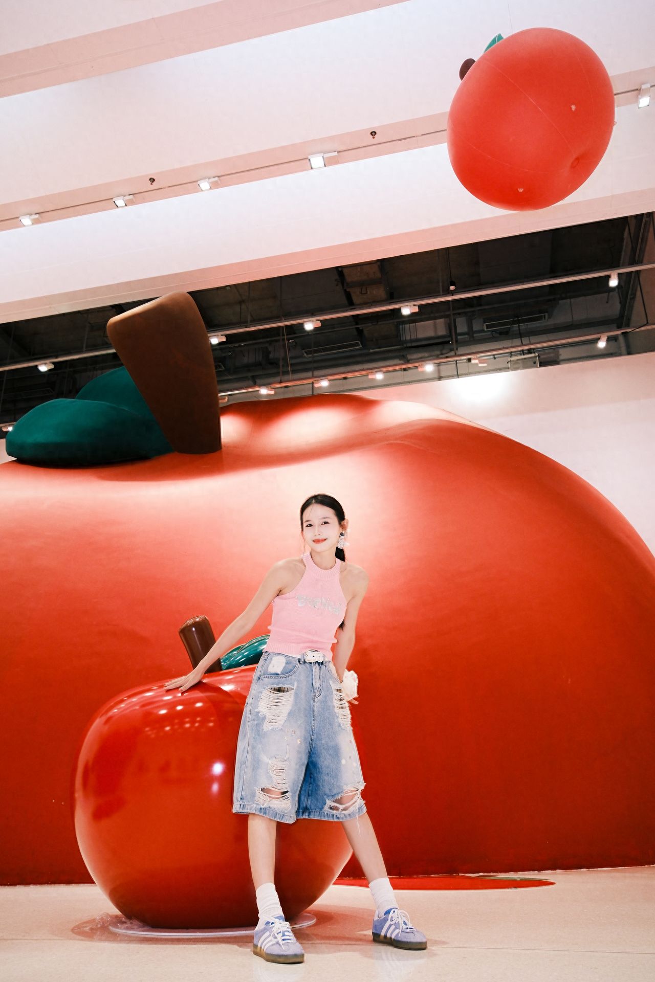 Photo by Beijing Times Art Museum - Red Apple Statue