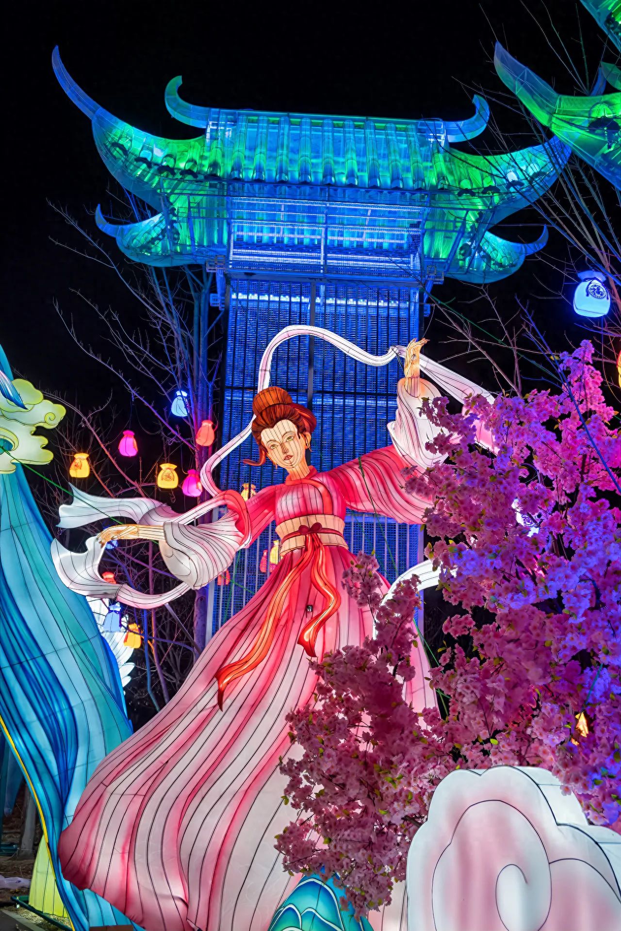 Photo by Beijing Wenyu River Park - Hanfu Dancers, Lanterns, and Night Scenery