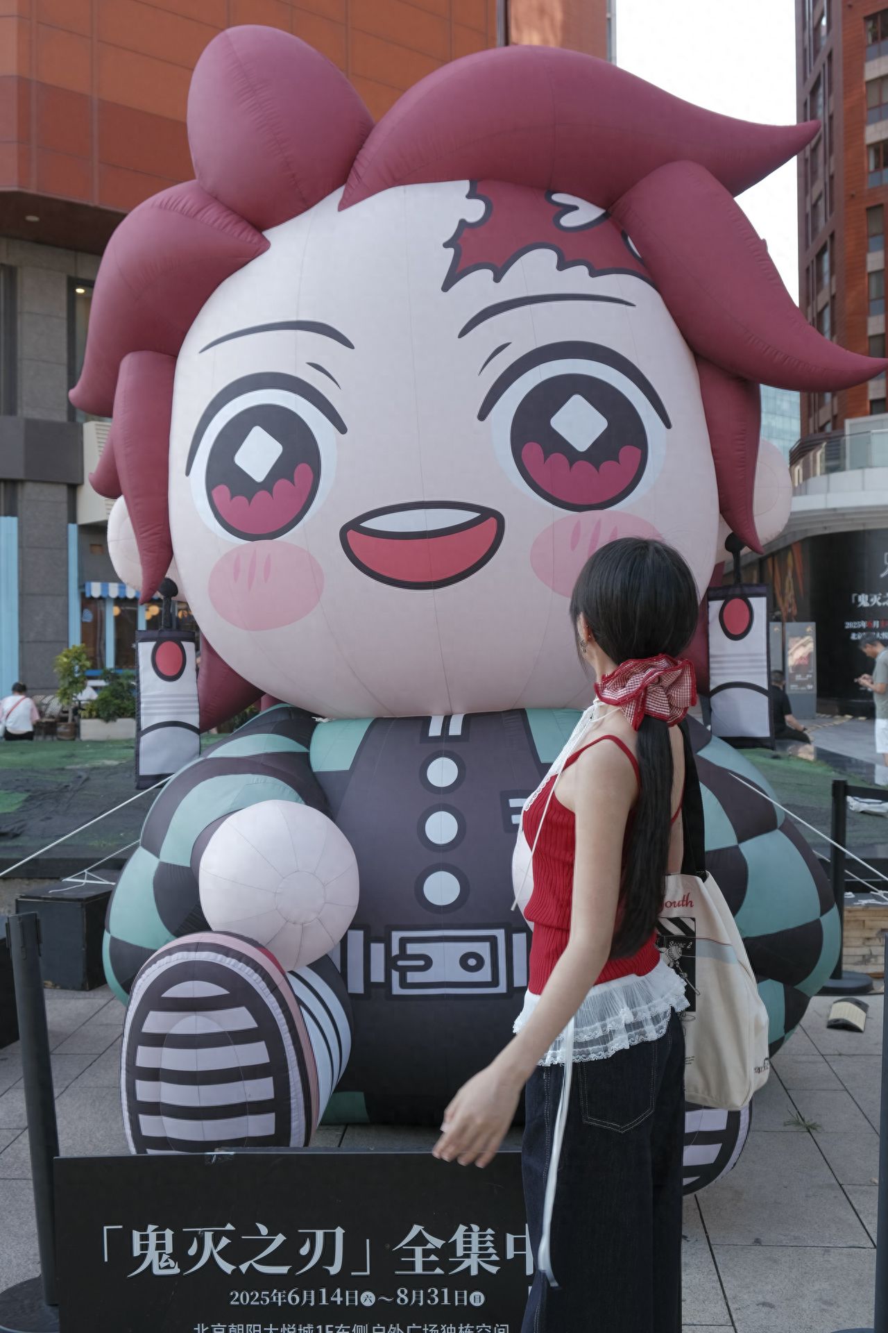 Photo by Chaoyang Joy City - Tanjiro Kamado Inflatable Model