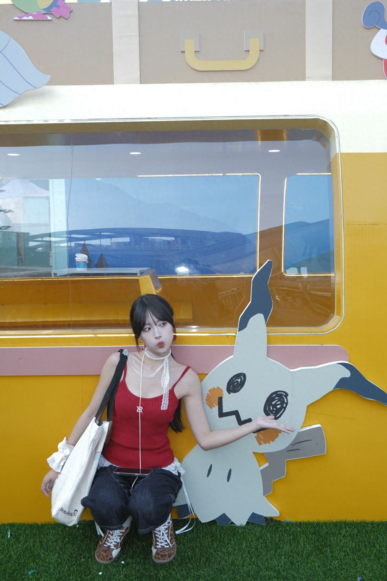 Photo by Chaoyang Joy City - White Pokémon Graffiti Sign