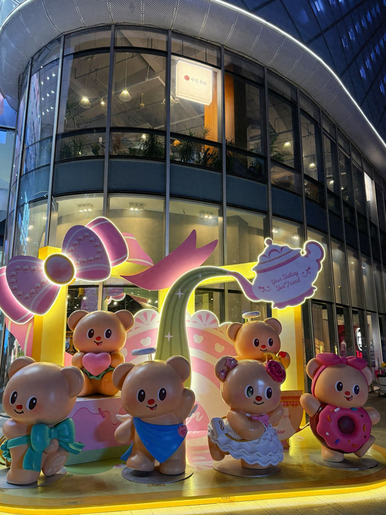 Photo by Beijing Chaoyang Hopson One - Night view of the butter bear installation at the entrance