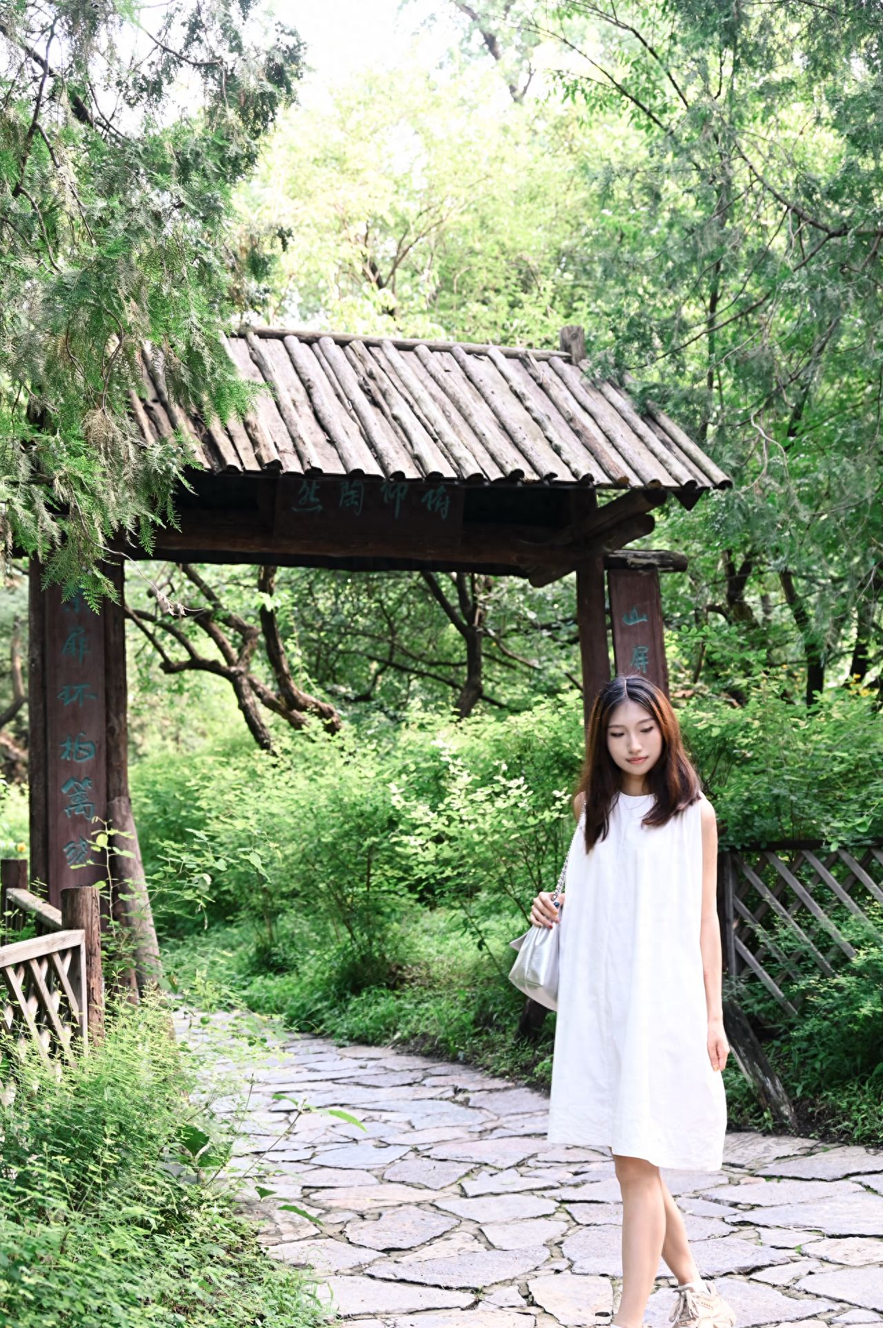 Photo by Fragrance Hill Park - Bow and Gaze at the Joyous Wooden Door