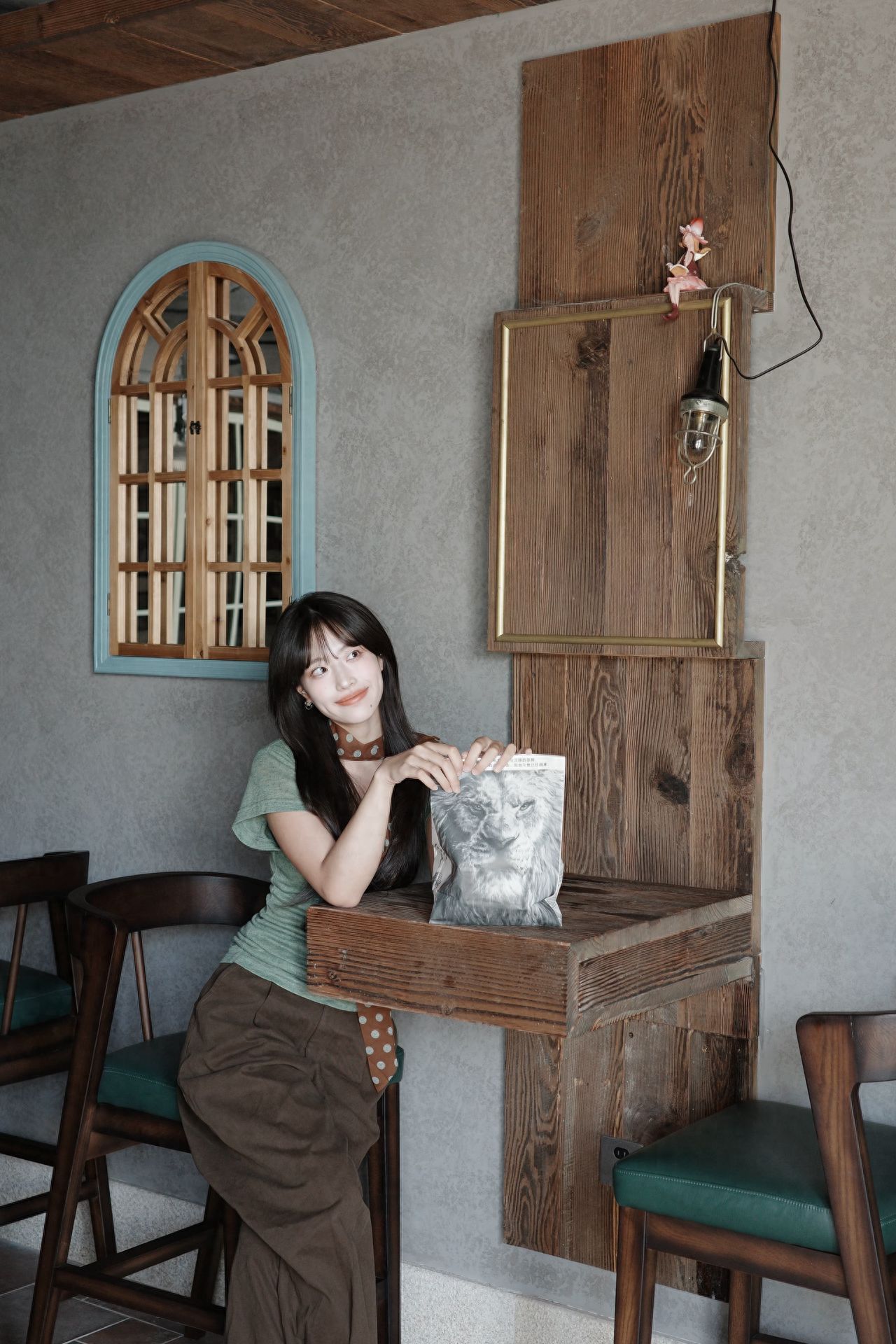 Photo by New York Bagel Museum (Blue Harbor Branch) - In front of the arched wooden windows