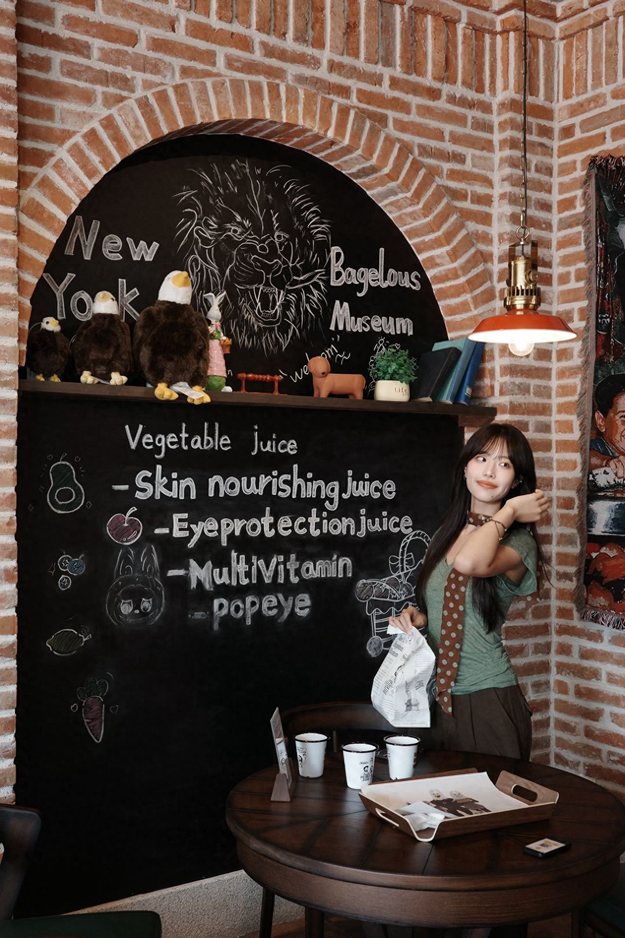Photo by Beijing New York Bagel Museum - In front of the blackboard inside the store