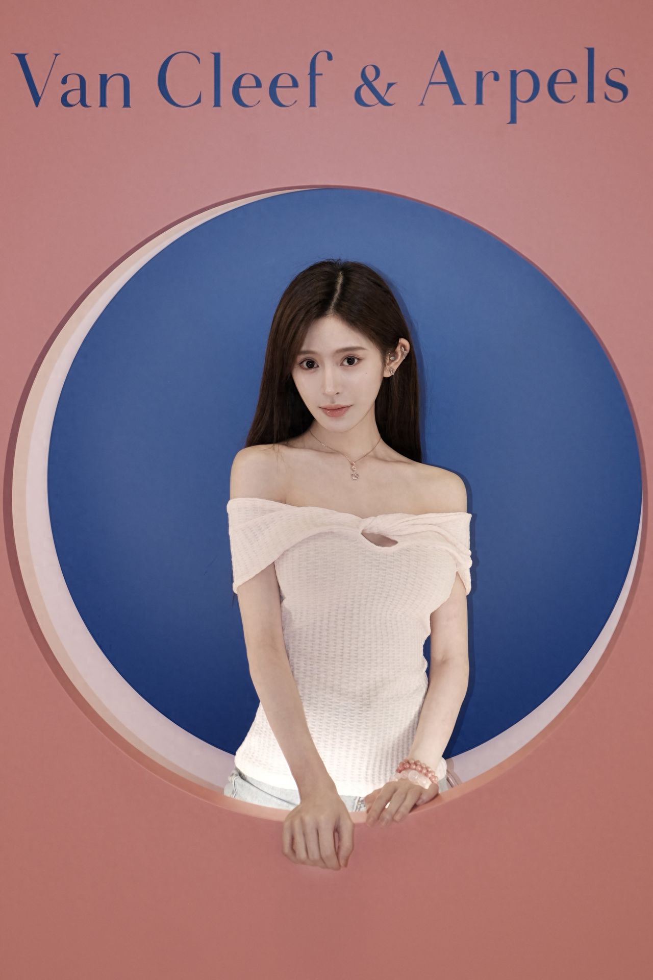 Photo by Wangfujing Central - Pink Round Frame Exhibition Board