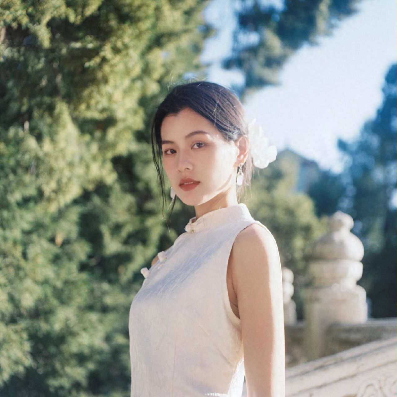 Photo by Confucius Temple and Guozijian Museum - Take a photo with green trees and stone railings.