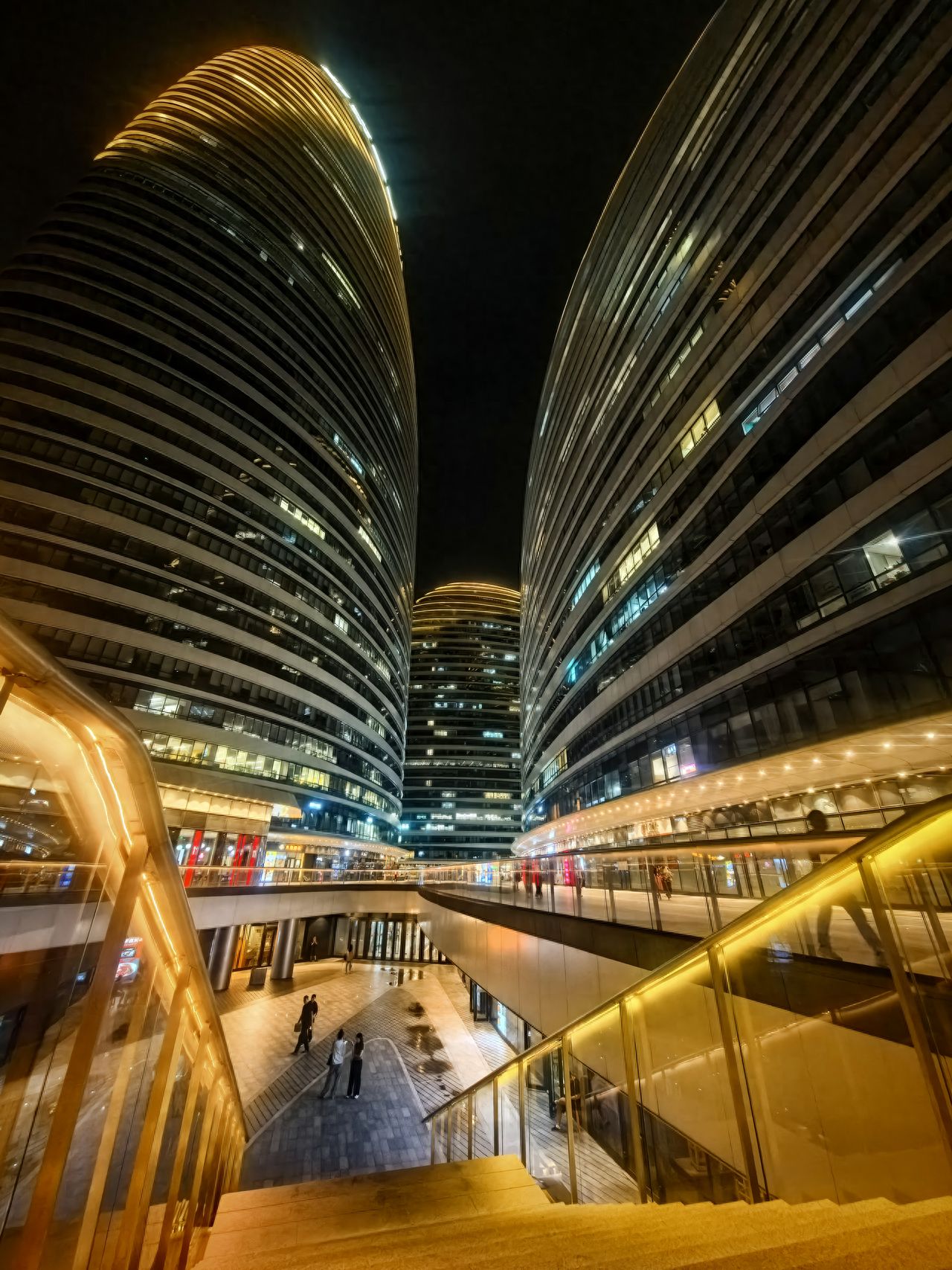 Photo by Wangjing SOHO - Night view at the entrance of the sunken square staircase