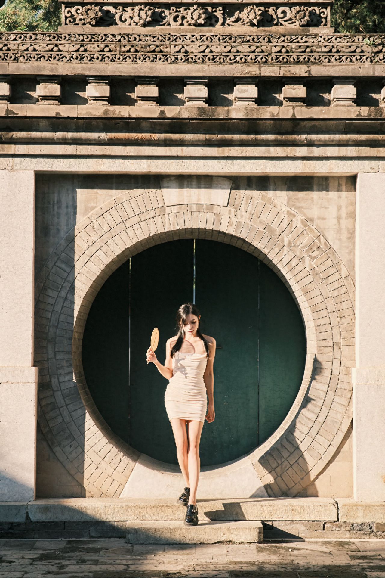 Photo by Beijing Wanshou Temple - Round Wooden Door