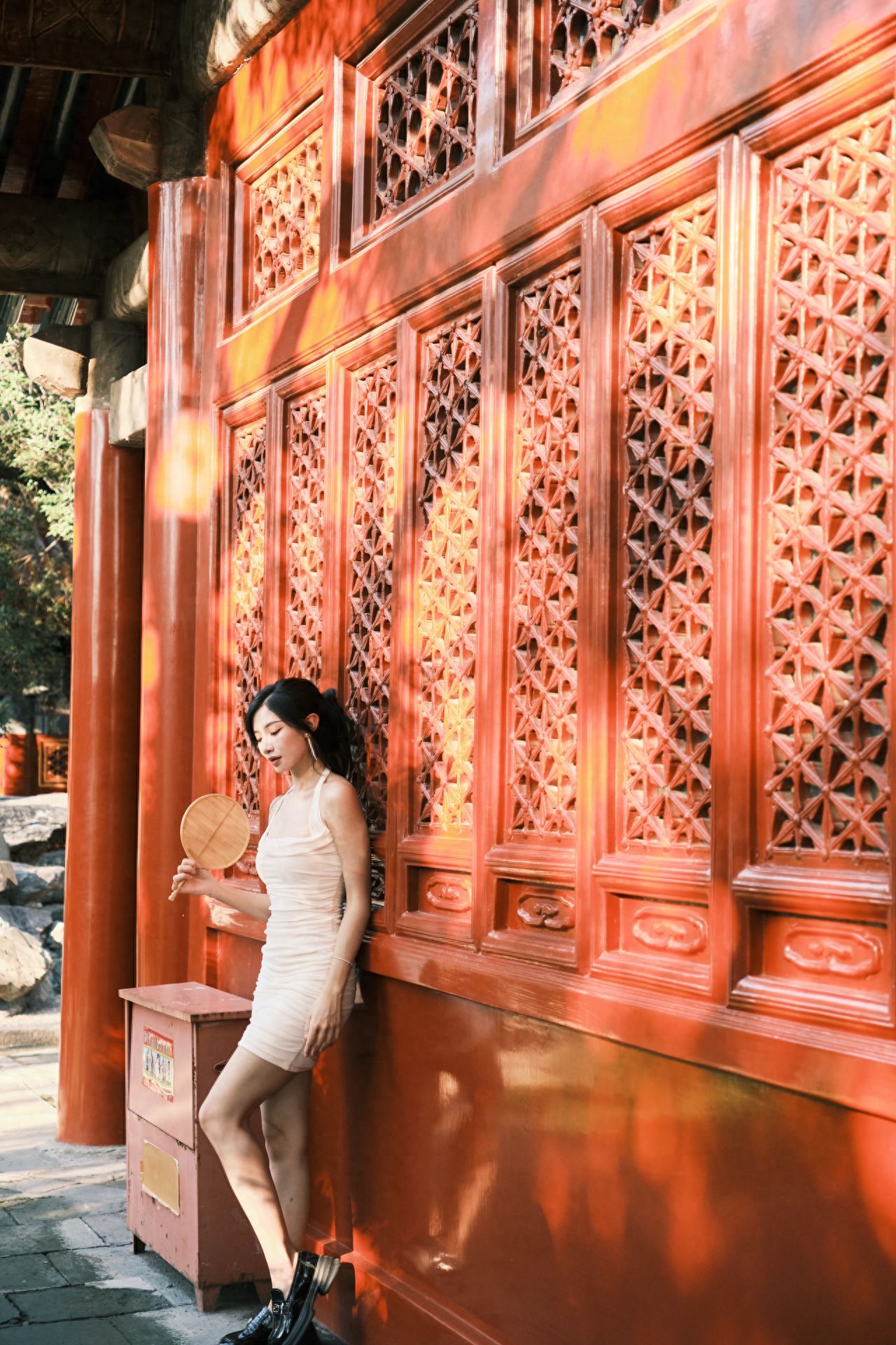Photo by Wanshou Temple in Beijing - in front of the red wooden windows