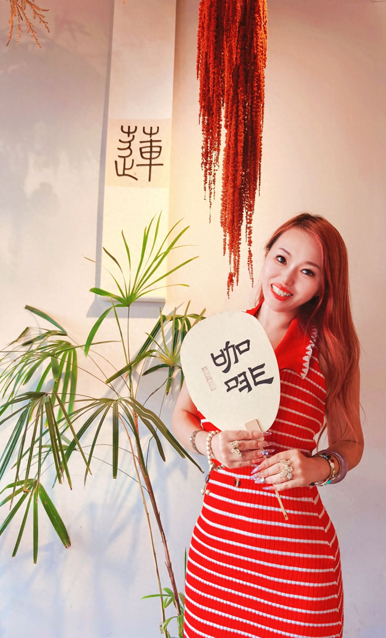 Photo by Ming City Wall Ruins Park - Taking a Photo with Indoor Wall-Mounted Plants