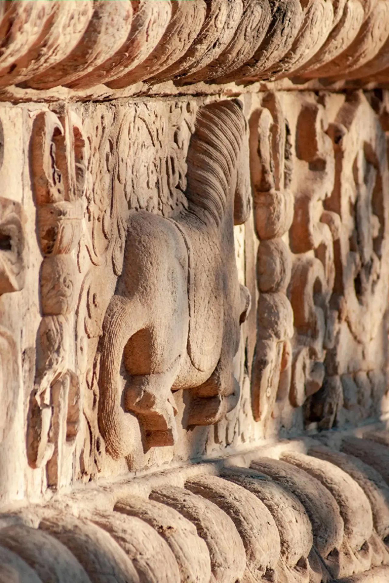 Photo by Close-up of the Horse Pattern Relief at the Five Pagodas Temple Pagoda
