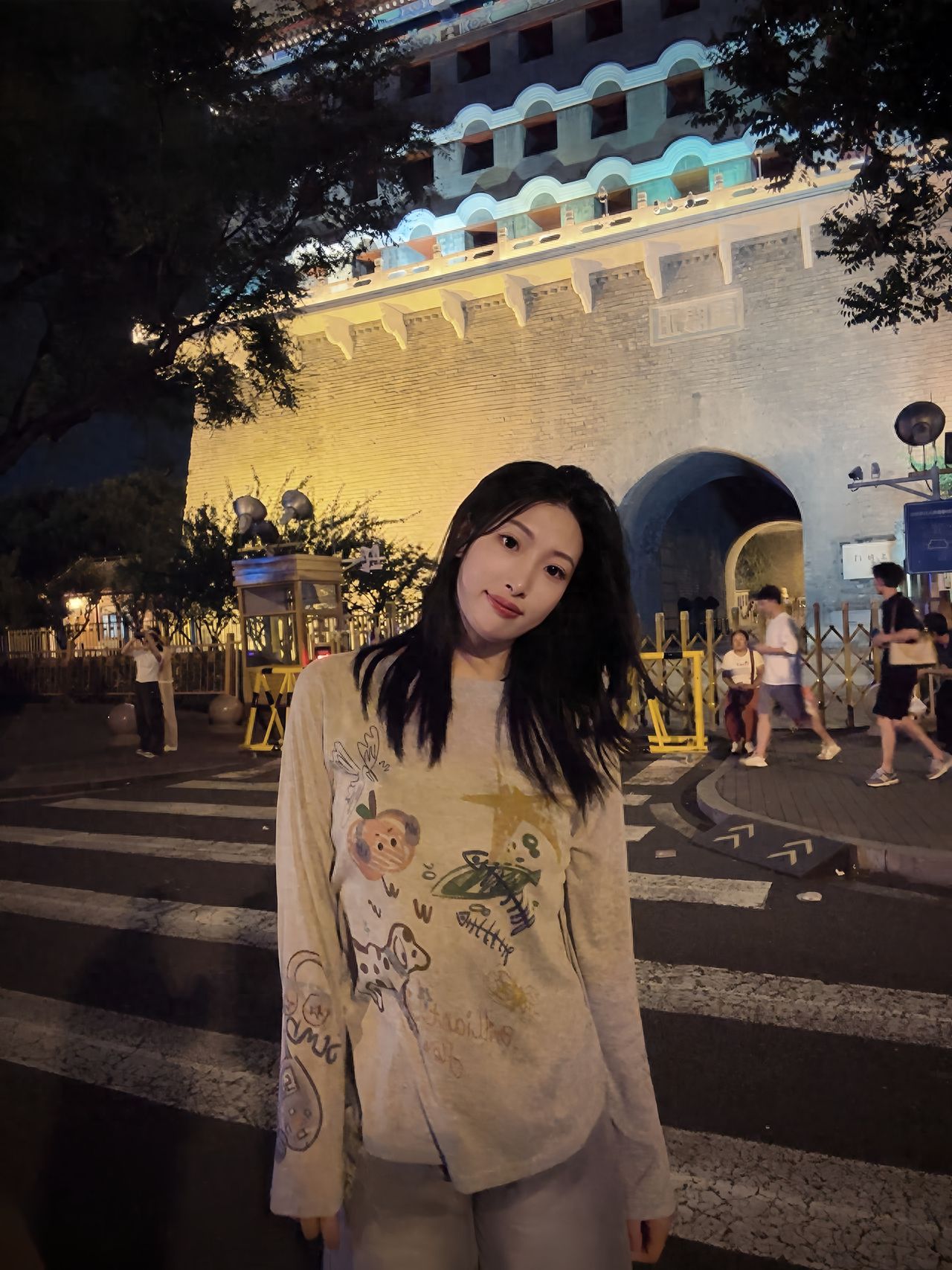 Photo by Beijing Zhengyangmen City Tower - Group photo with the city tower architecture and trees