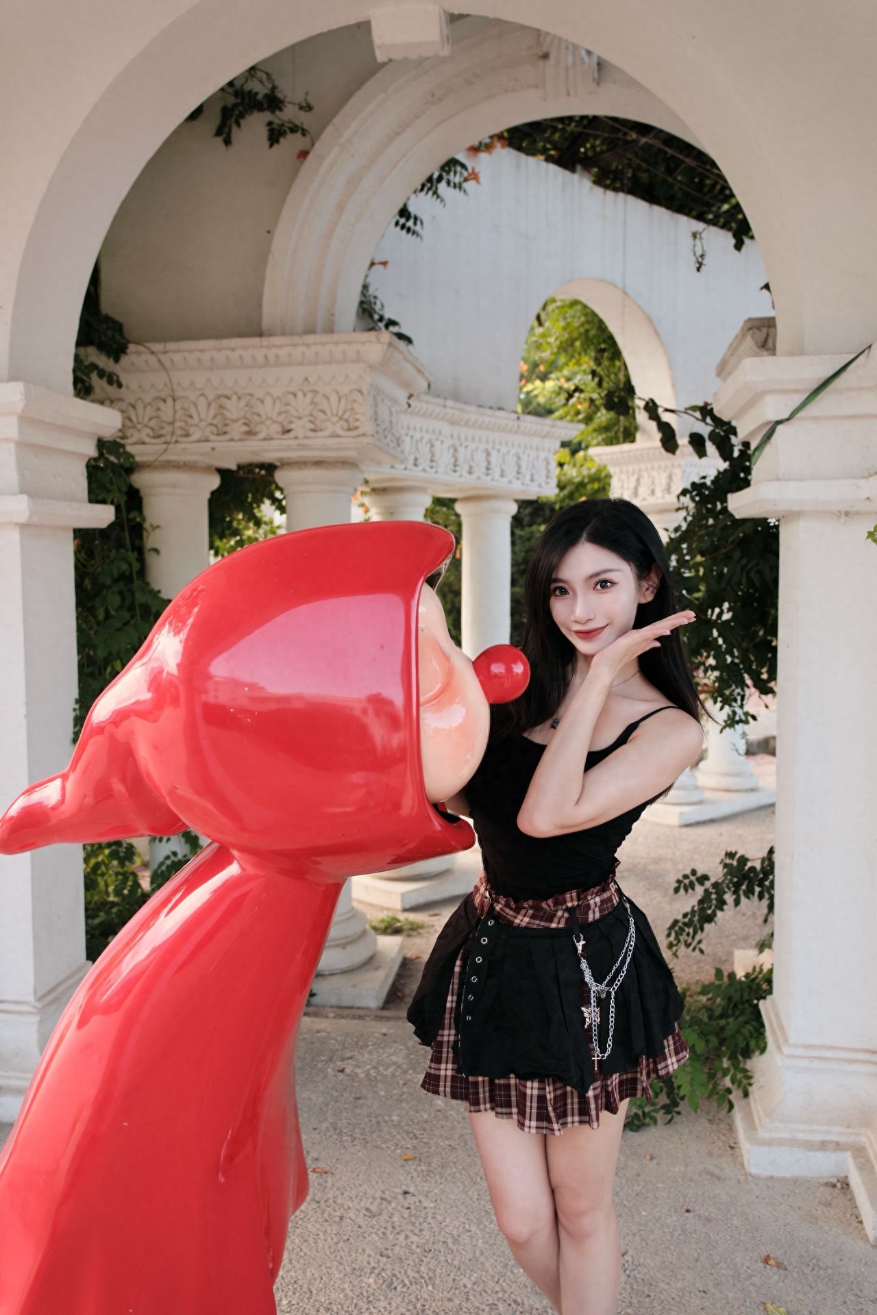 Photo by Moon River Art Town - Red Statue Group Photo