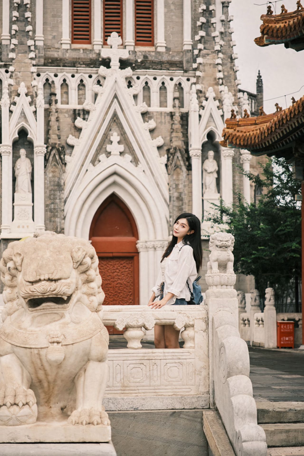 Photo by Xishiku Catholic Church - Stone Lion Fence
