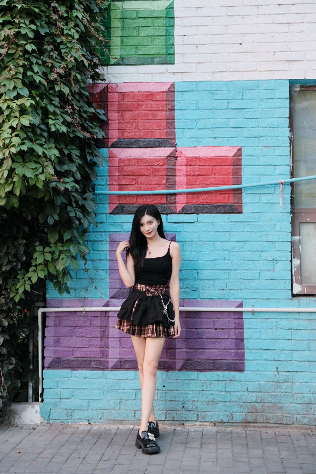 Photo by Moon River Art Town - in front of the Tetris Wall Mural