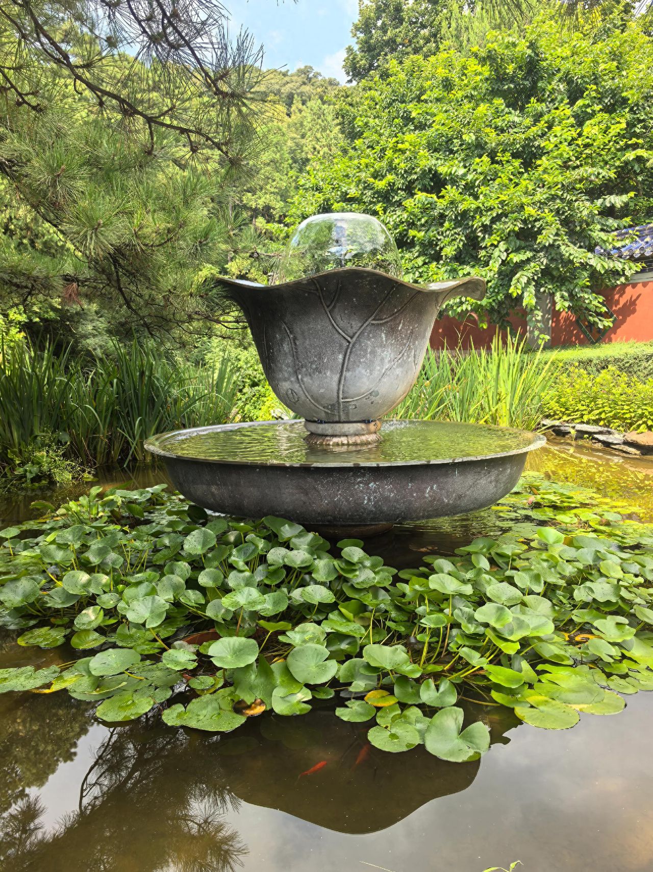 Photo by Tan Zhe Temple - Lotus Pond Stone Platform Fountain and Pine Trees