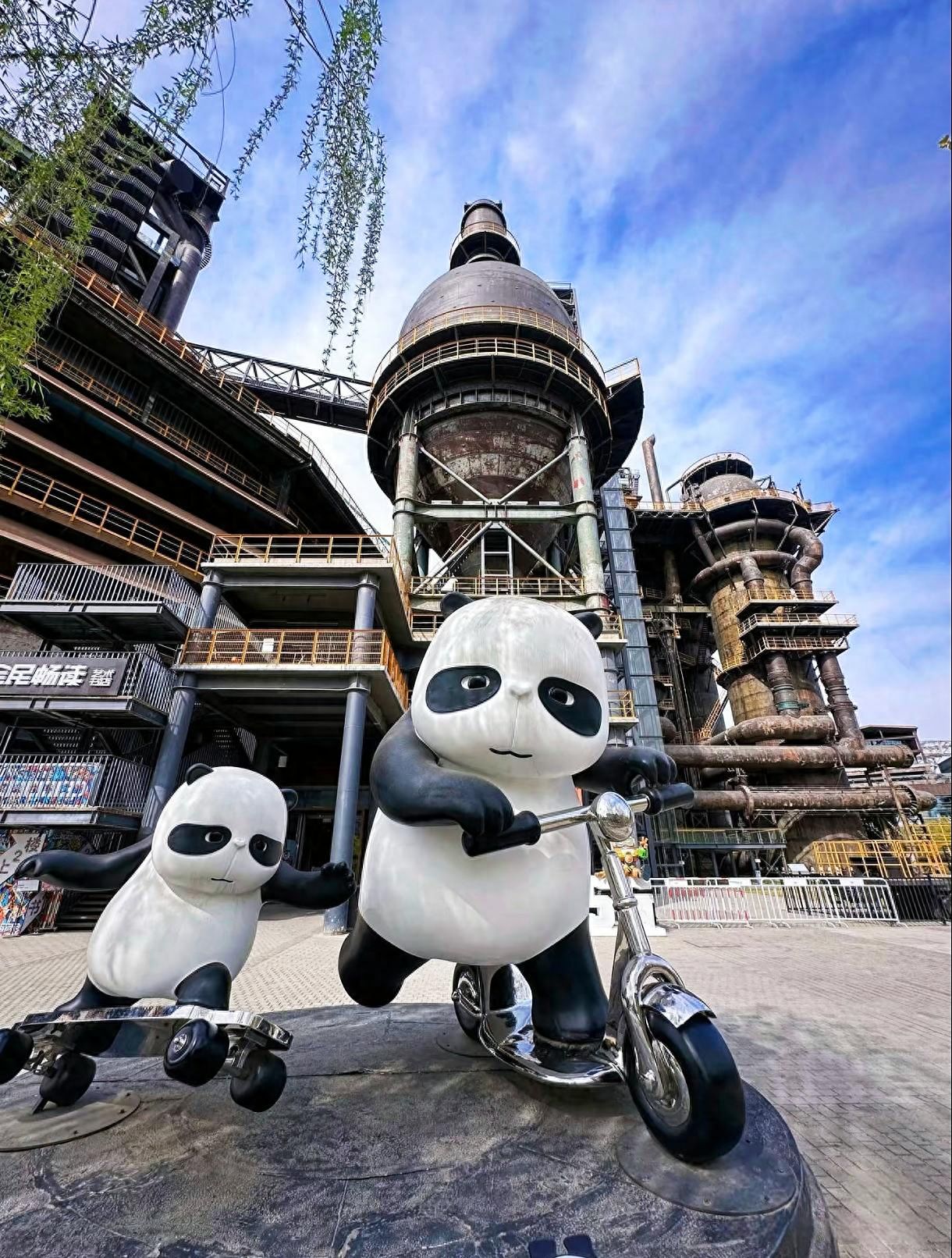 Photo by Beijing Shougang Park - Taking Photos with Panda Sculptures and Industrial Buildings