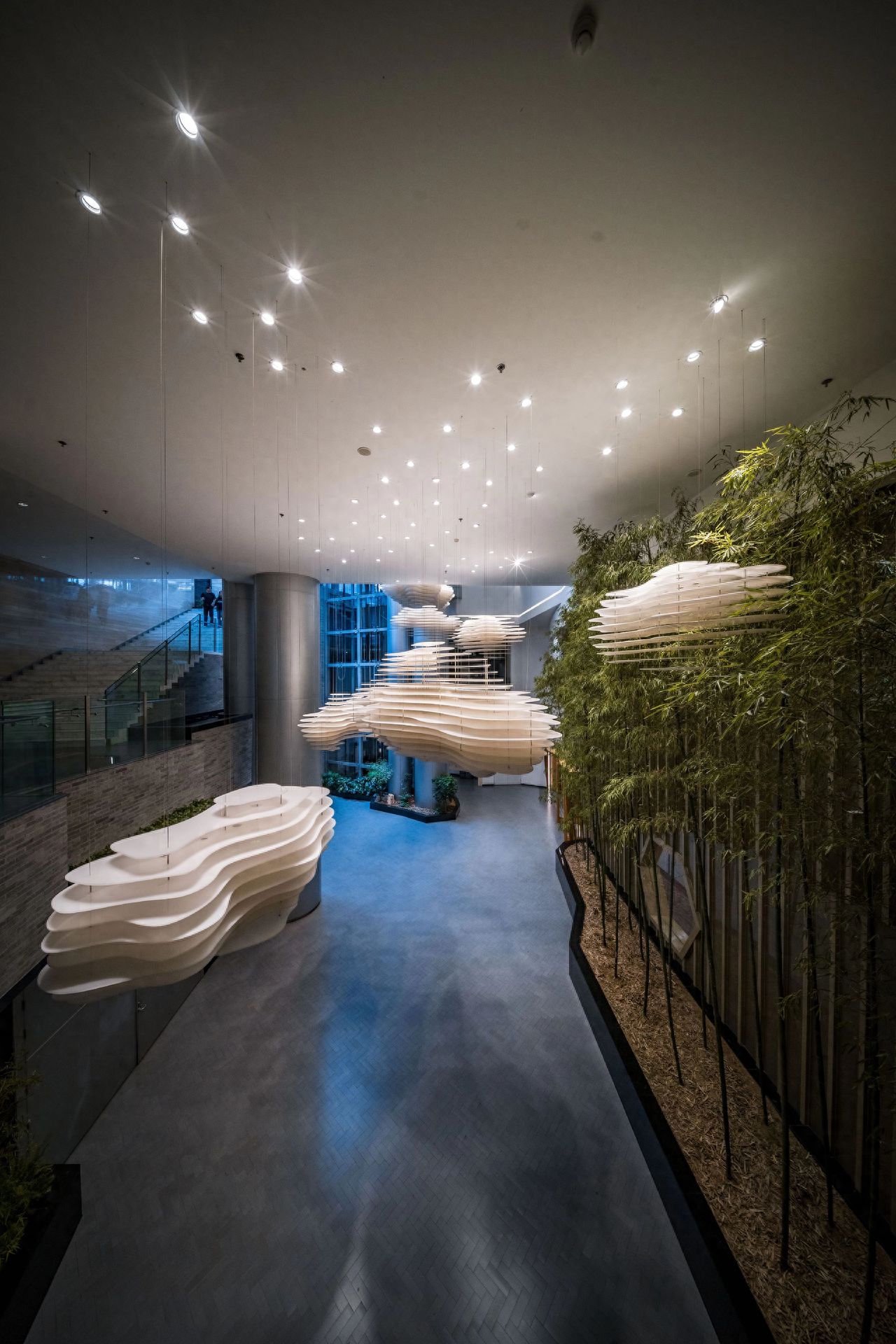 Photo by Beijing Rongke Zhong Shu Ge - Green plants in the corridor and cloud decoration lights