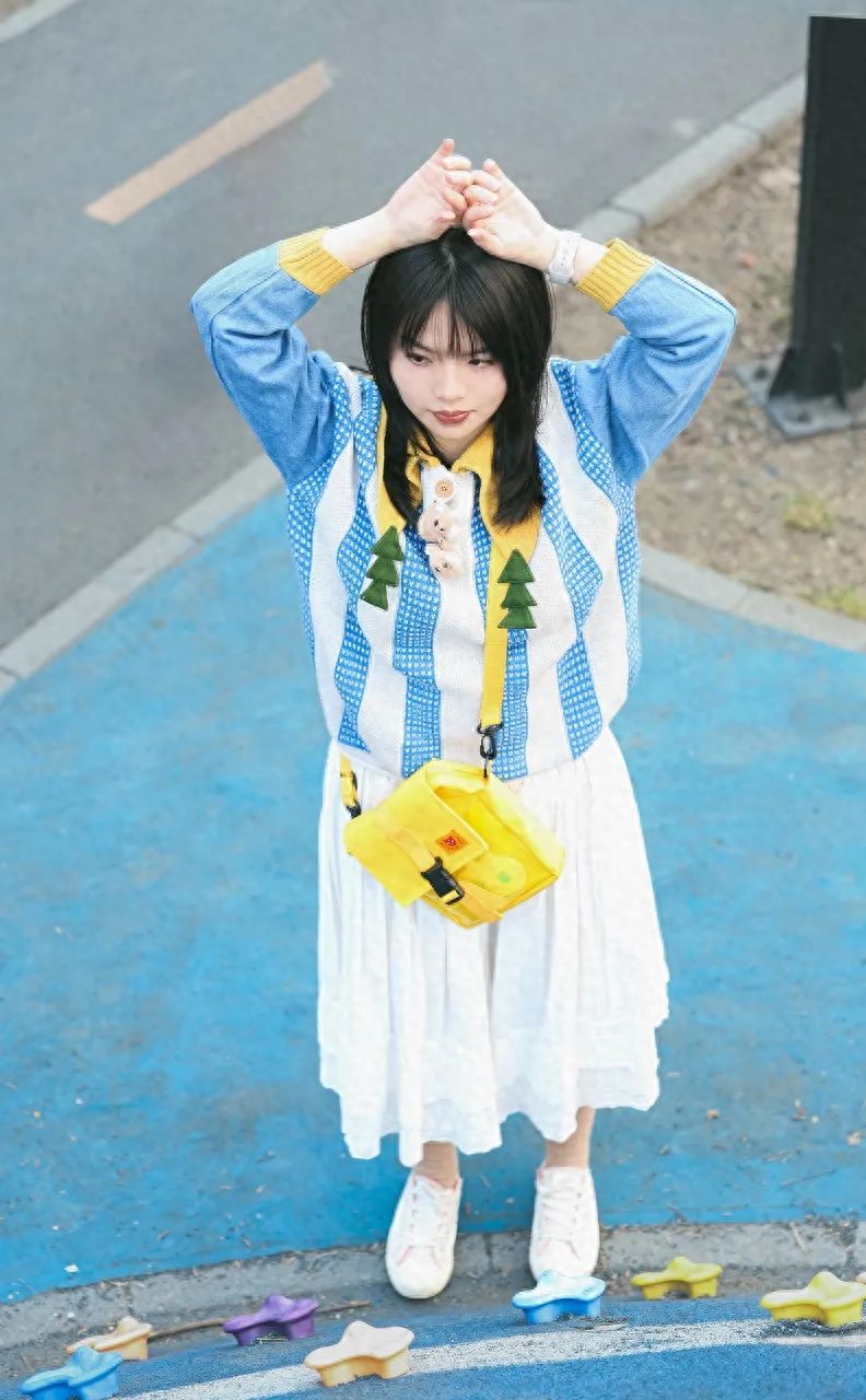 Photo by In front of the blue climbing equipment at Taiyanggong Park.