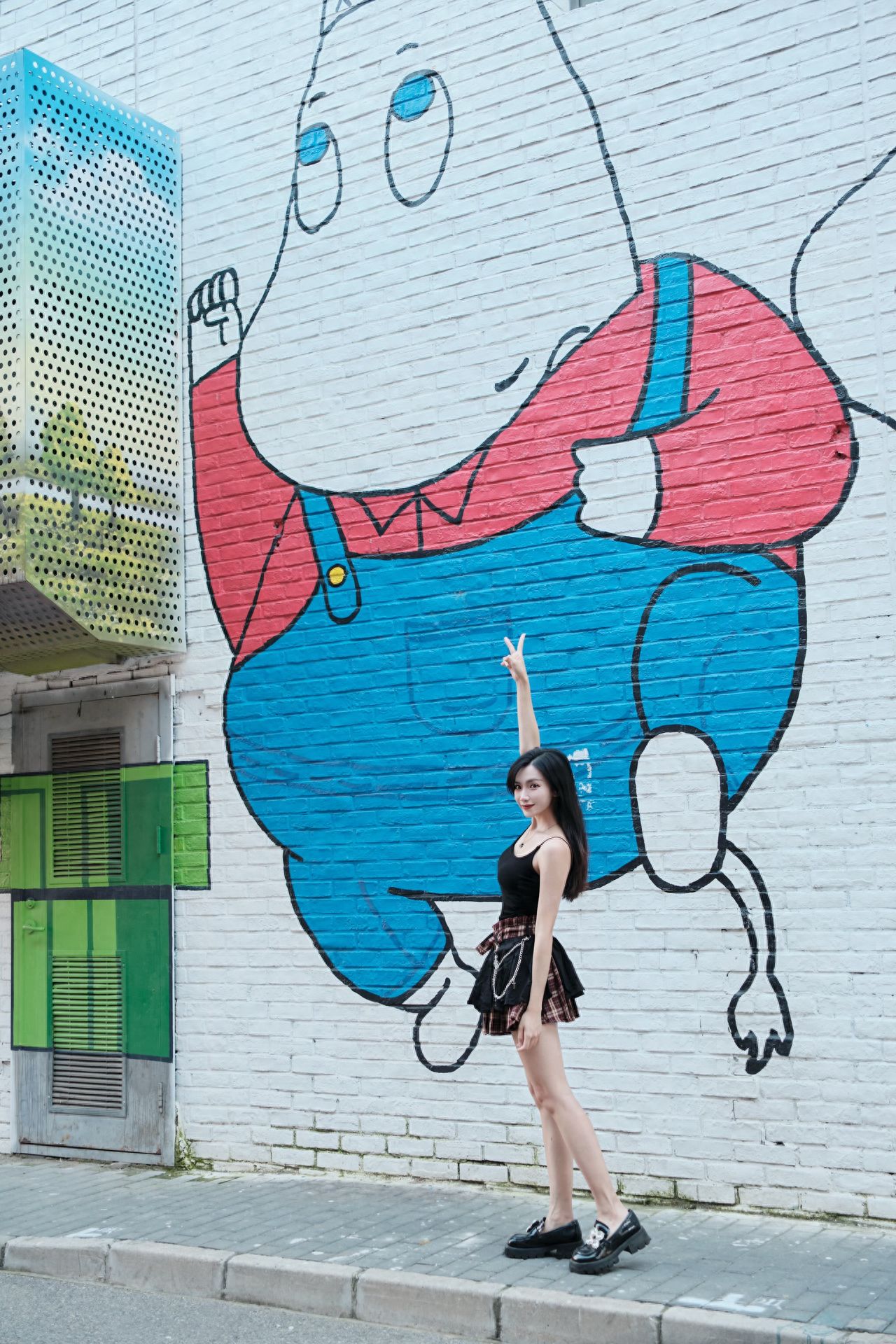 Photo by Moon River Art Town - Suspenders Hippo Mural