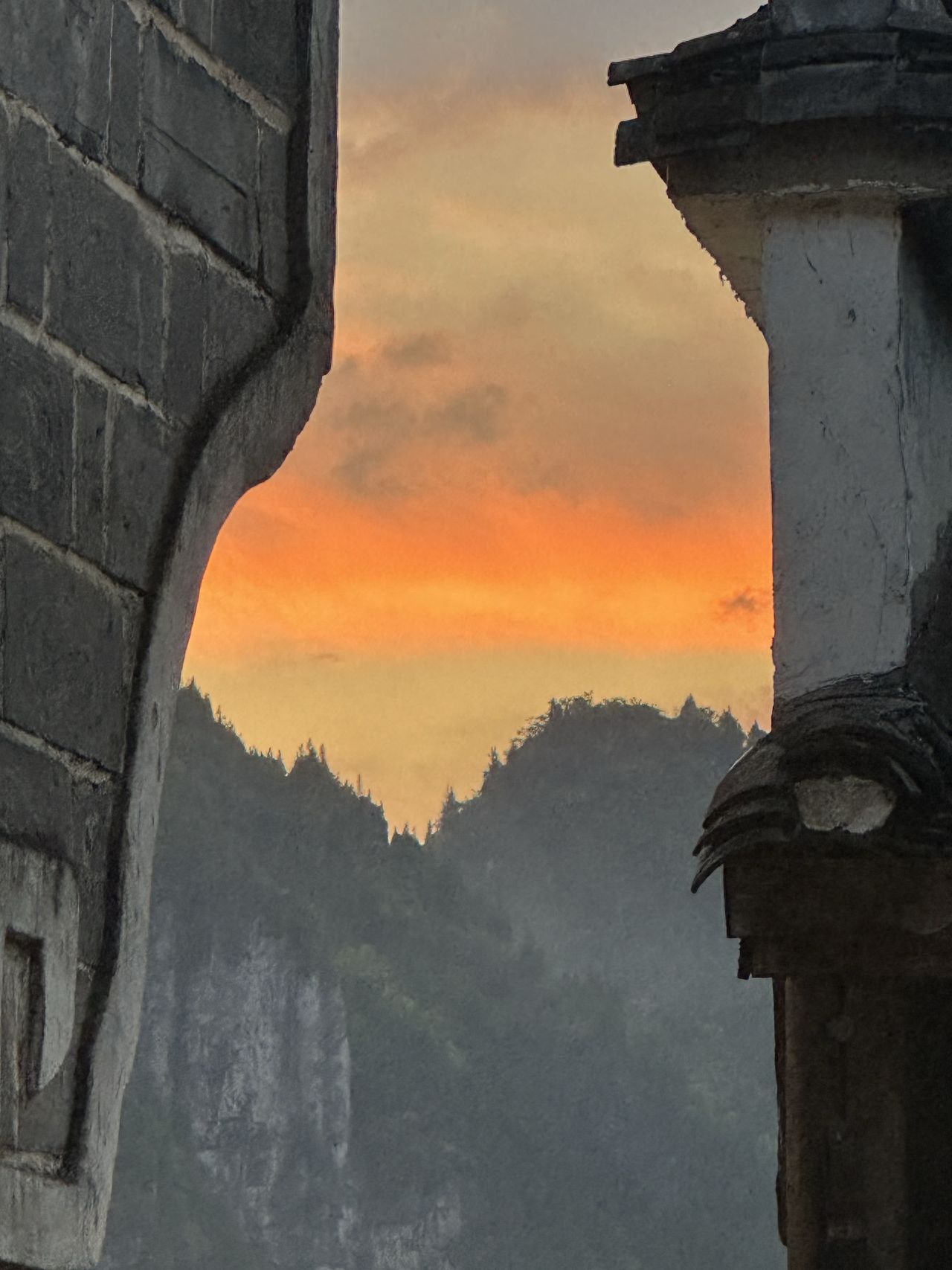 Photo by Biancheng Chaxiong Scenic Area - Mountain View Sunset in the Architectural Gaps